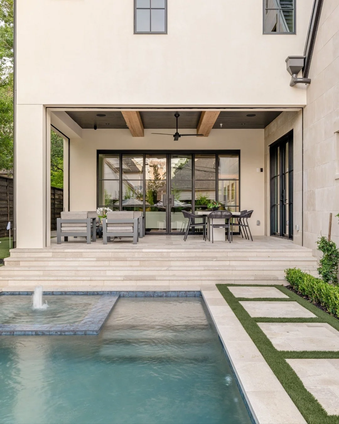 Courtyard pool built into the steps for a seamless transition into the backyard 

#stainbackconstruction #dallasbuilder #customhomes #luxuryhomes #homedesign #outdoorliving