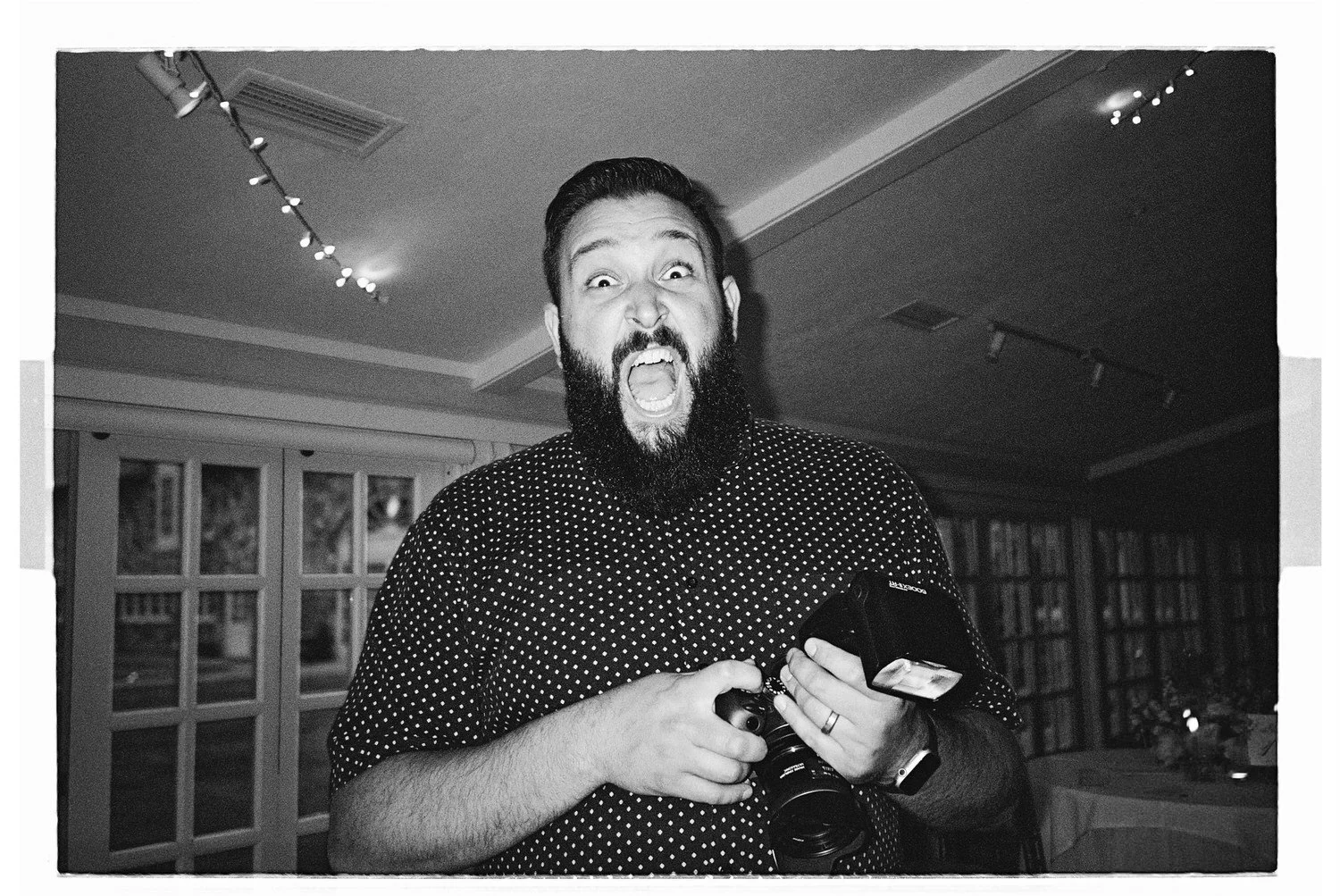 Ben Law holding a camera in Traverse City, Michigan