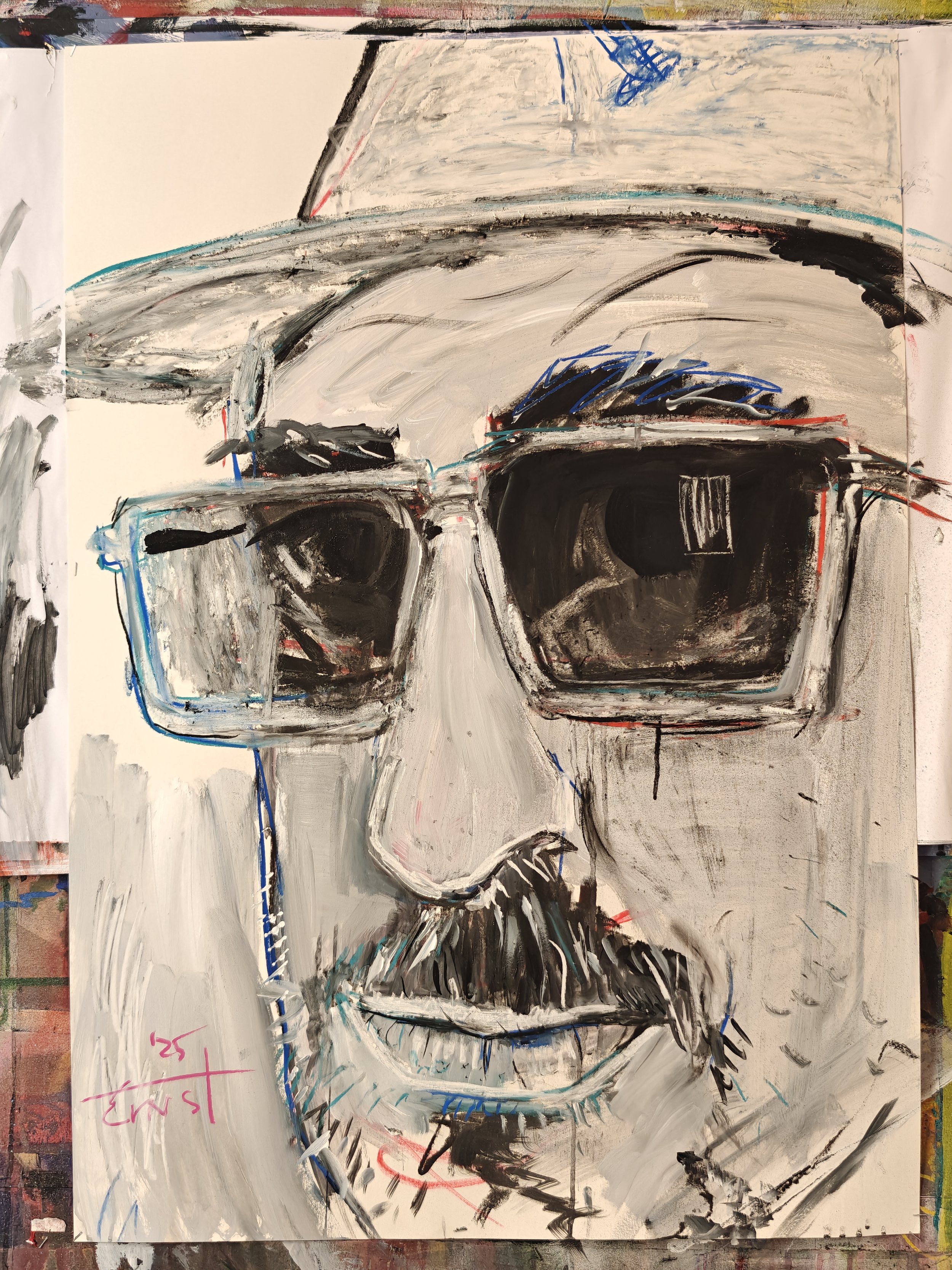 An expressive portrait of a man wearing dark sunglasses and a wide-brimmed hat, with a mustache and beard, painted in bold, loose brushstrokes.