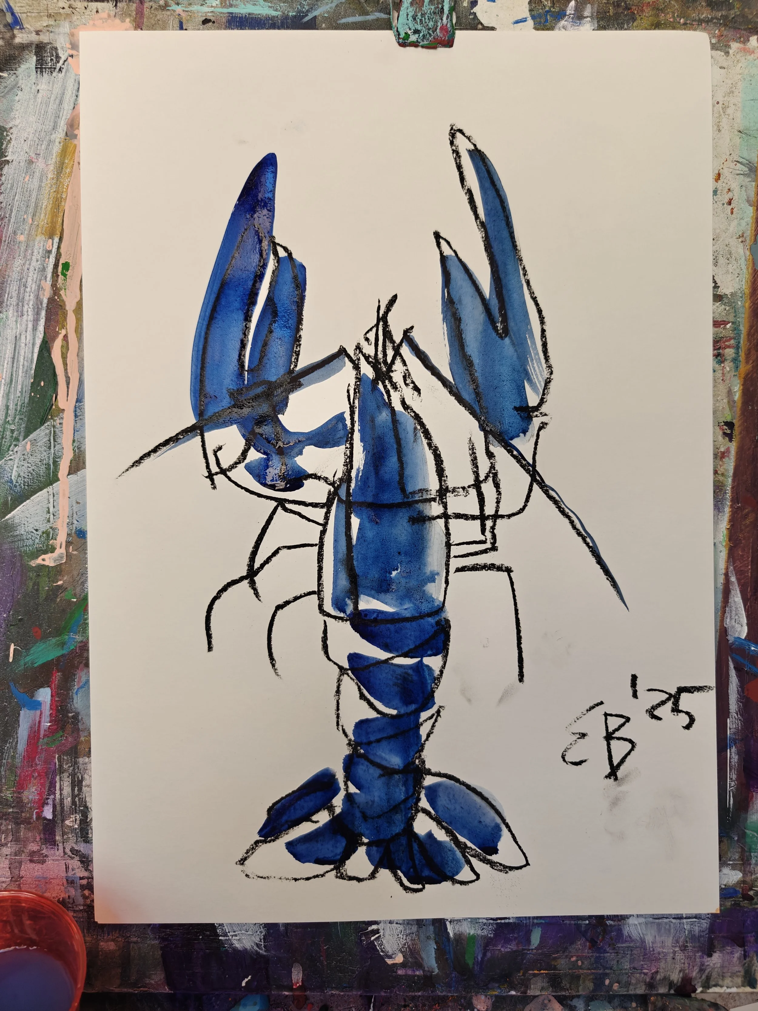 A watercolor painting of a lobster with blue and black brushstrokes, signed with the dates '12.25' and initials 'B' in the bottom right corner.