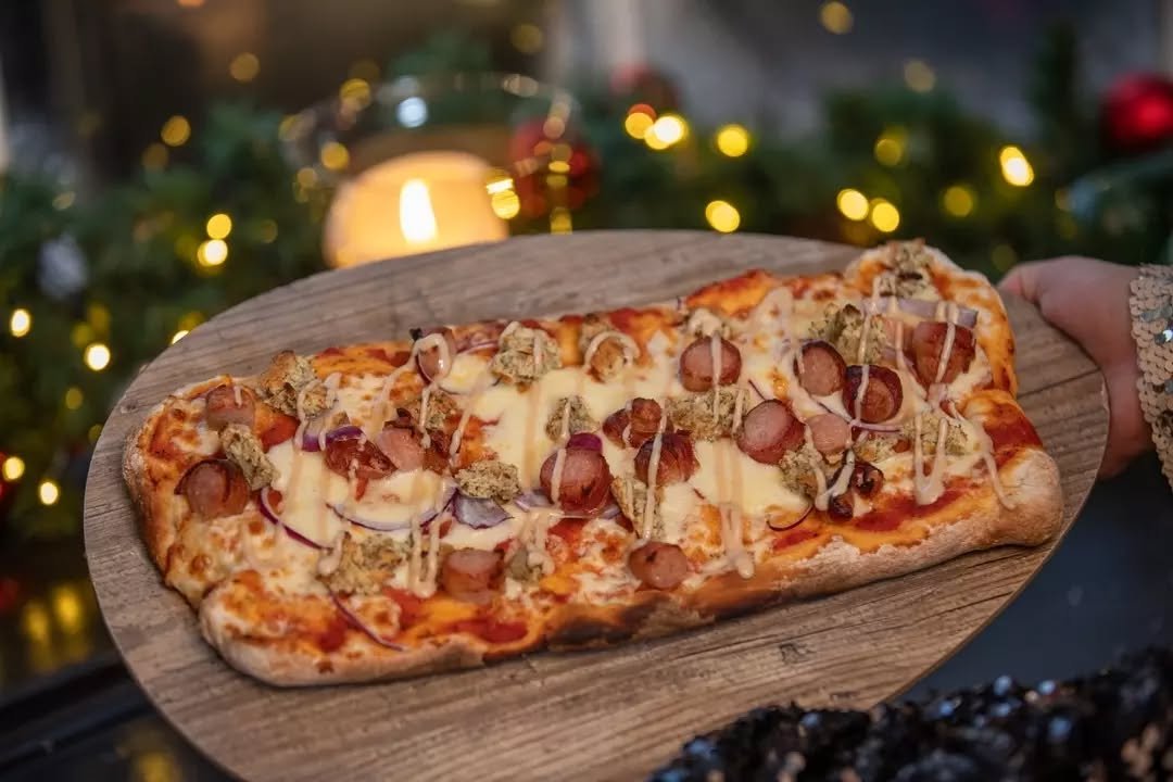 🎅✨ **The most wonderful time of the year is coming**, and so are our Christmas special pizzas! What delicious toppings will make your christmas pizza-perfect? Comment below! 🍕❤️