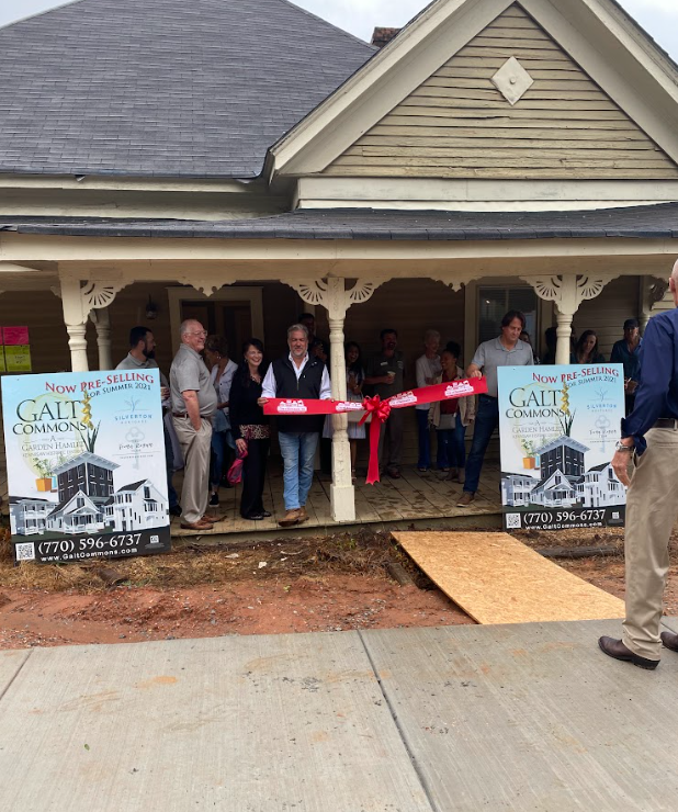 Such an exciting day! We cut the ribbon in front of the original historic home on the property! We saved this one as the last to be finished (of phase 1)!
