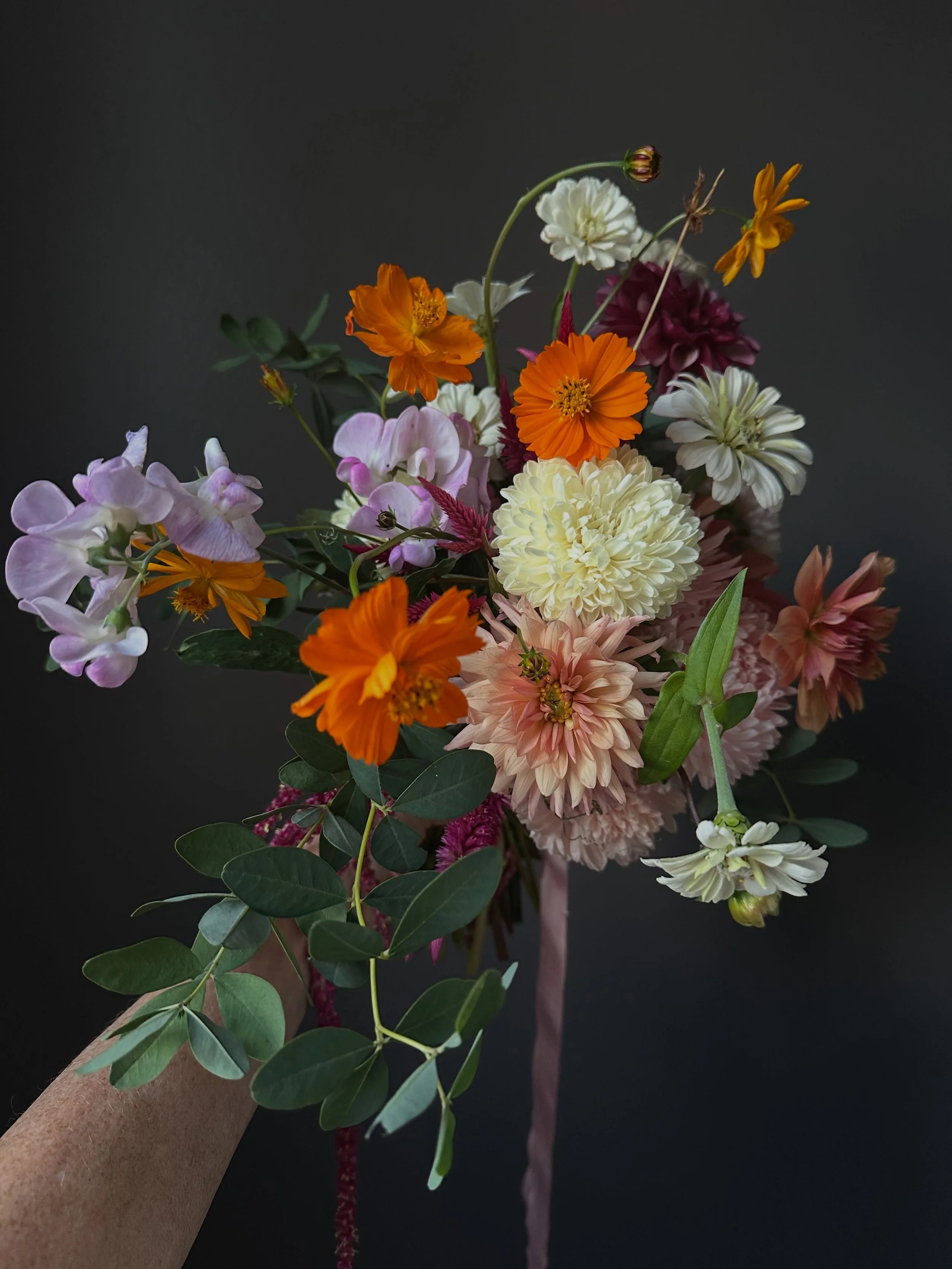 A bouquet for a bride using seasonal British flowers. Making some urns for the venue with Dylan who was captured by my friend @jannelford I used British flowers from @thechobhamflowerfarm