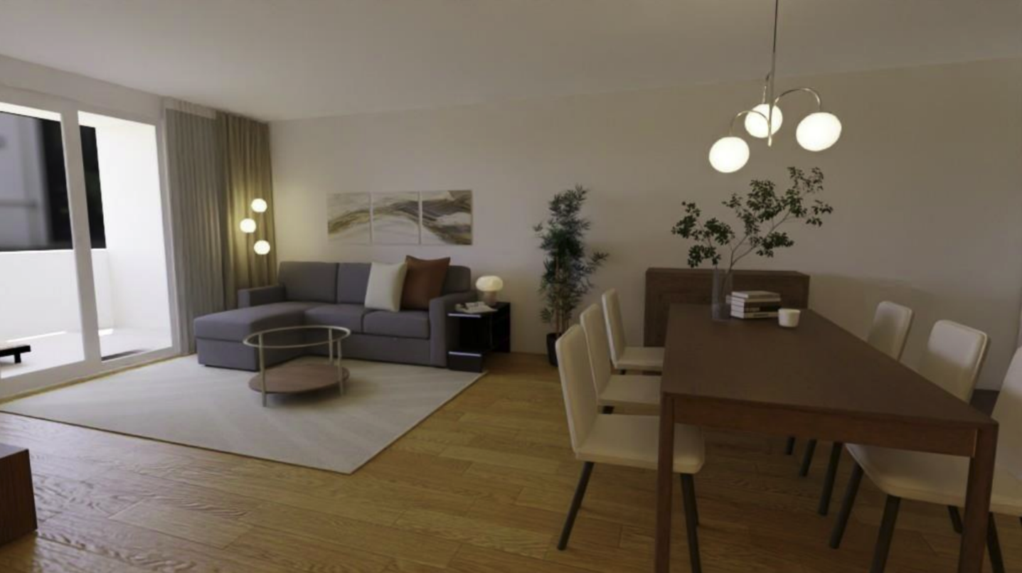 Living room with a gray sectional sofa, glass coffee table, art on the wall, potted plants, and a dining table with white chairs and a chandelier.