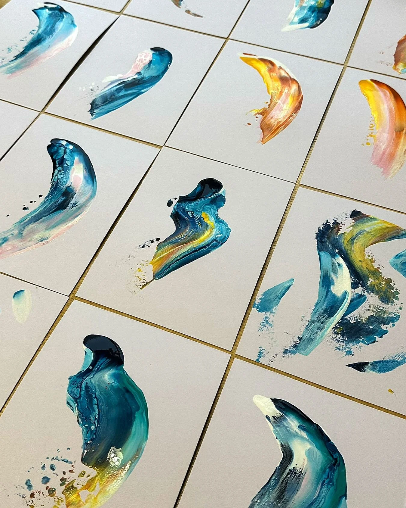 I loved the effects and colour palette I had created with pouring medium and acrylic paints, so I just kept making more of these colourful swooshes!