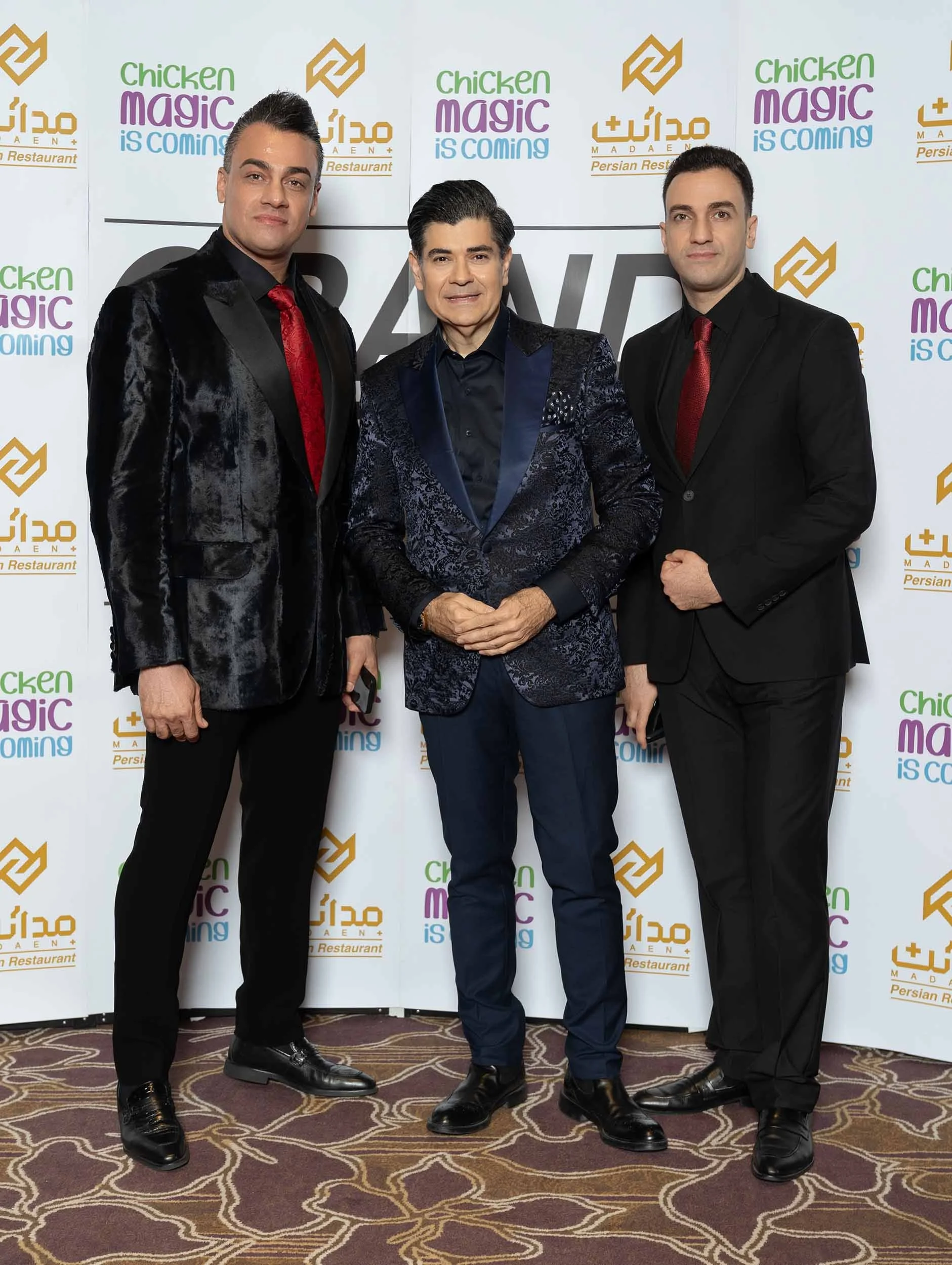 VIP guests posing for photos during the Al Madaen Restaurant launch event in Dubai.