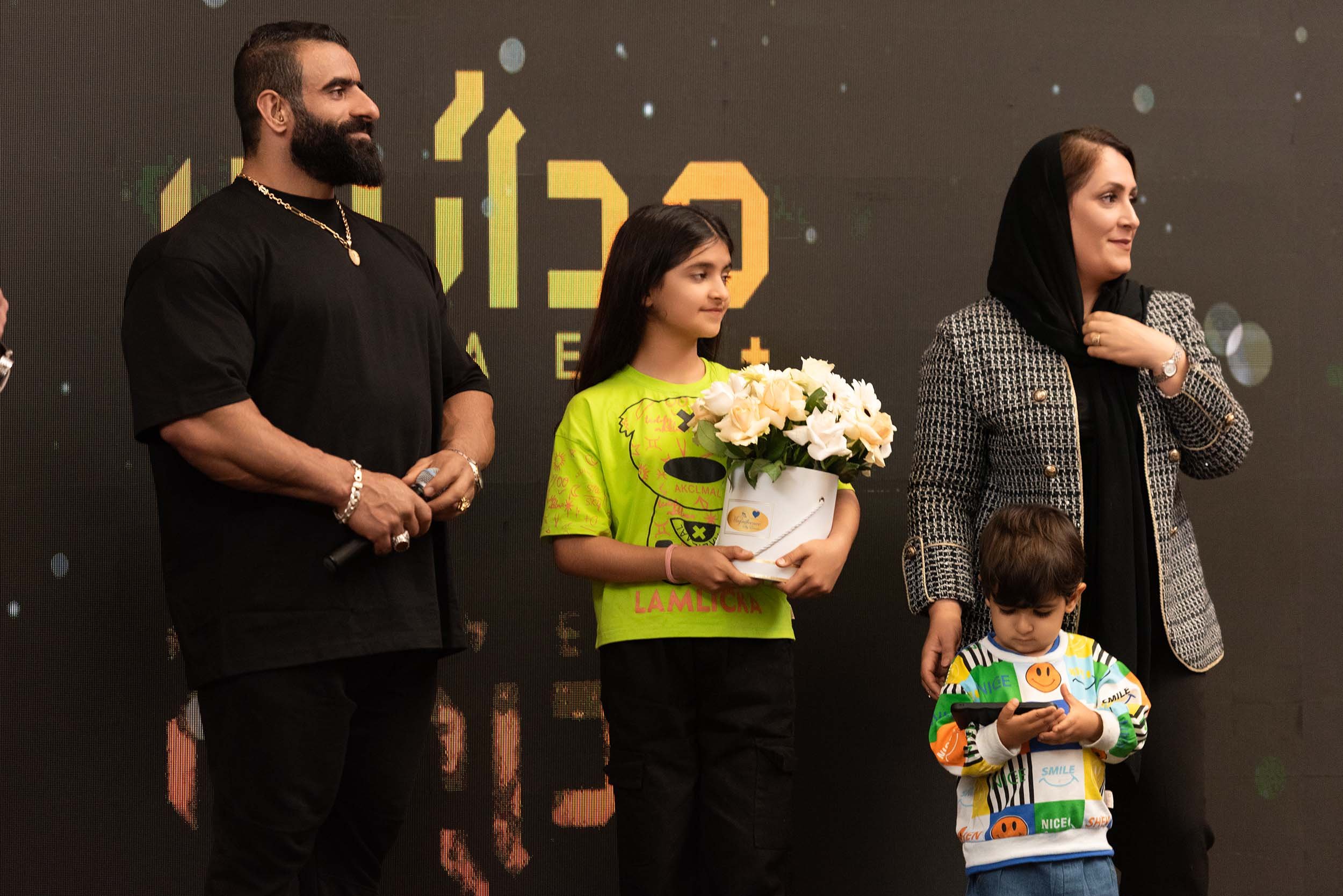 Stage presentation and special guests during a restaurant grand opening event in Dubai.