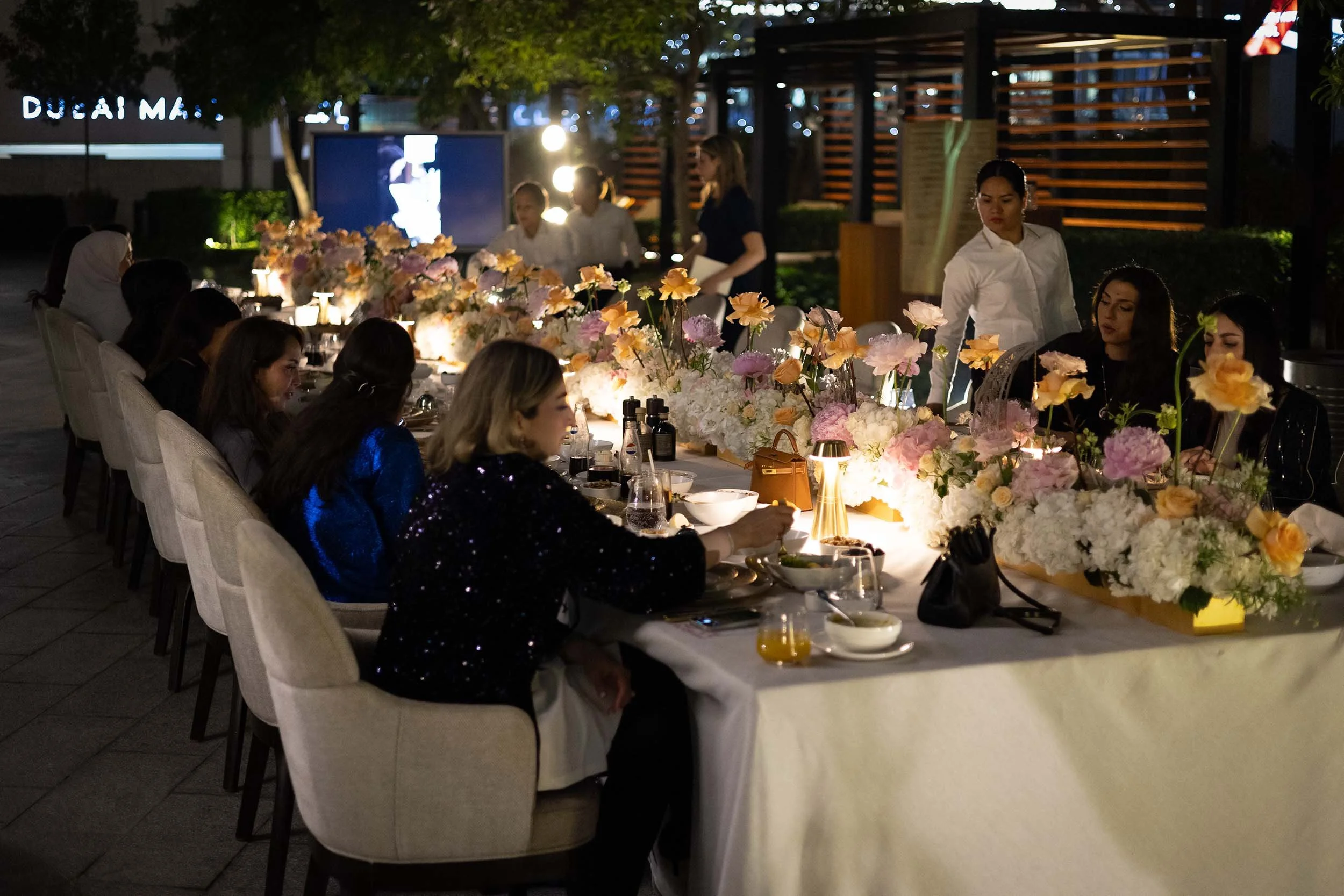 Guests attending an exclusive Alaghband Jewellery VIP dinner and networking event in Dubai.
