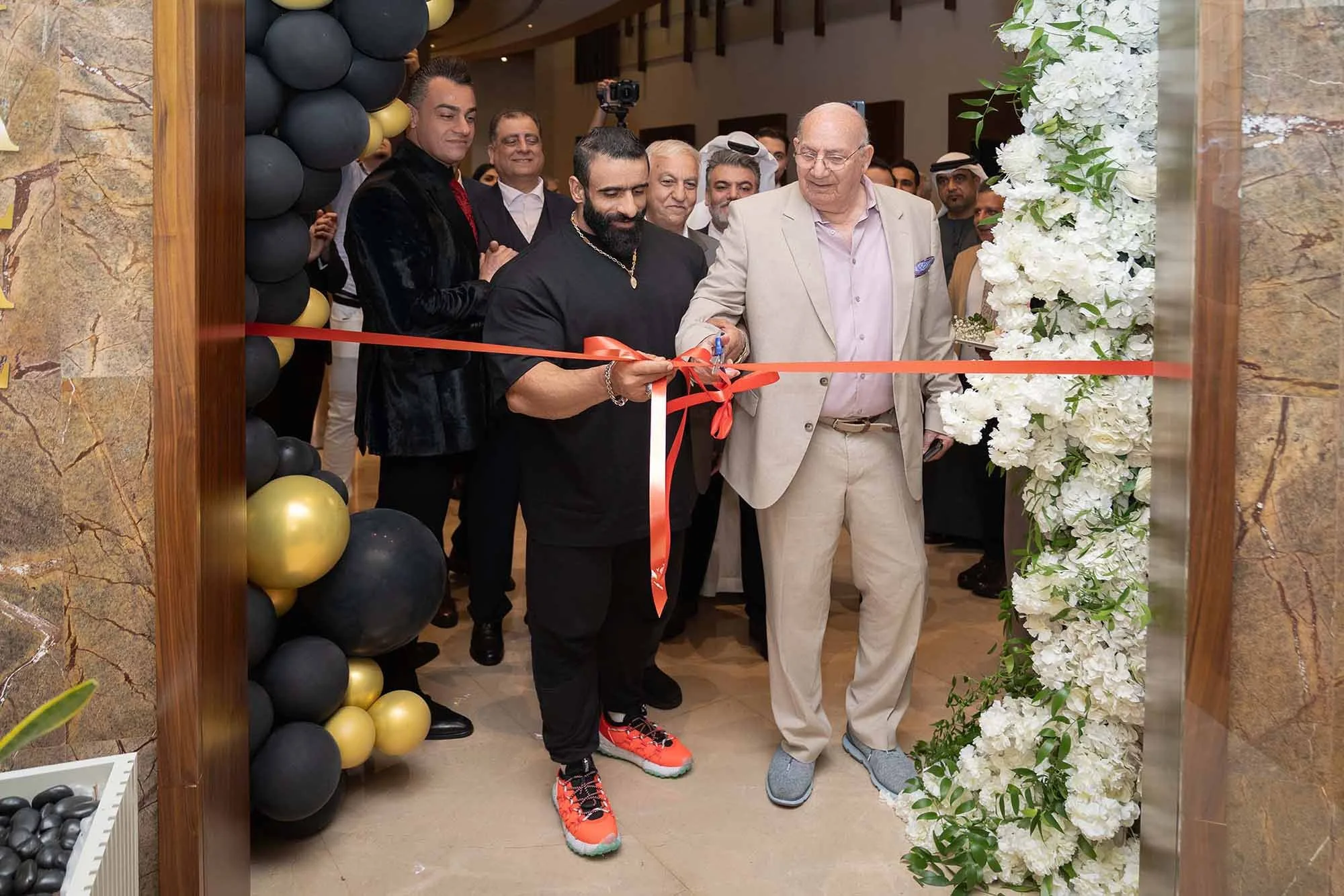 Corporate event photography and videography in Dubai capturing a luxury grand opening and ribbon-cutting ceremony.