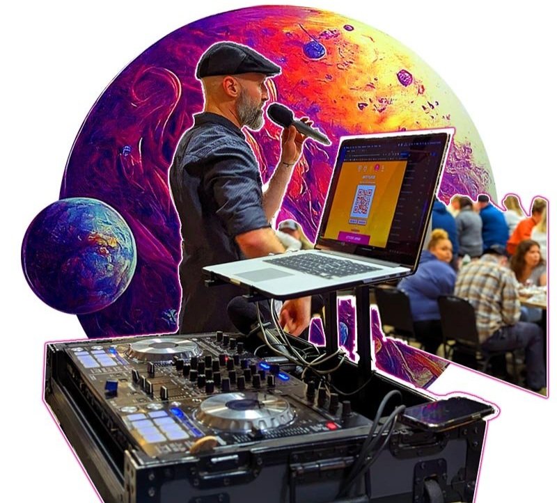 Jindo Pro Host performing with live sound gear, laptop running Jam Deck software, and mobile smartphone display.