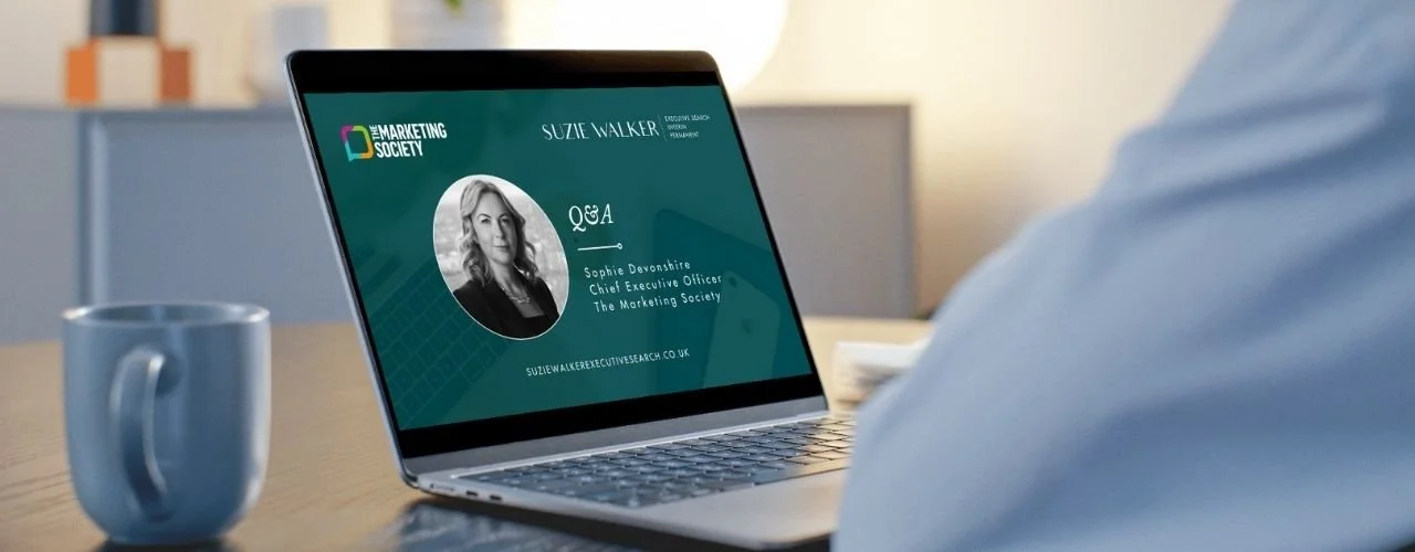 Pictured: Senior marketing leader watching Suzie Walker's Q&A with Sophie Devonshire, CEO of The Marketing Society | Inside the Minds of Senior Marketing Leaders: A Year in Q&As | Suzie Walker