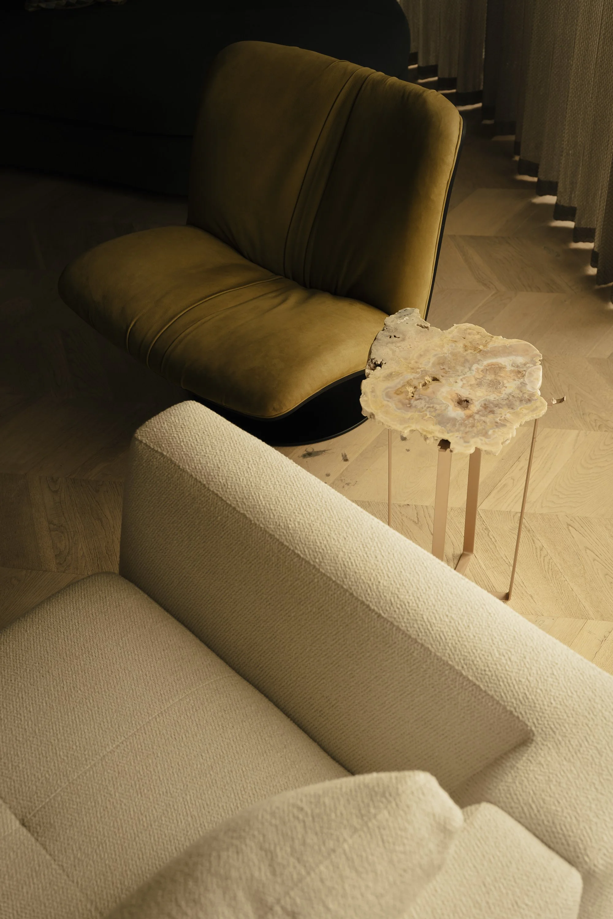 top perspecitve green chair and white sofa.jpg