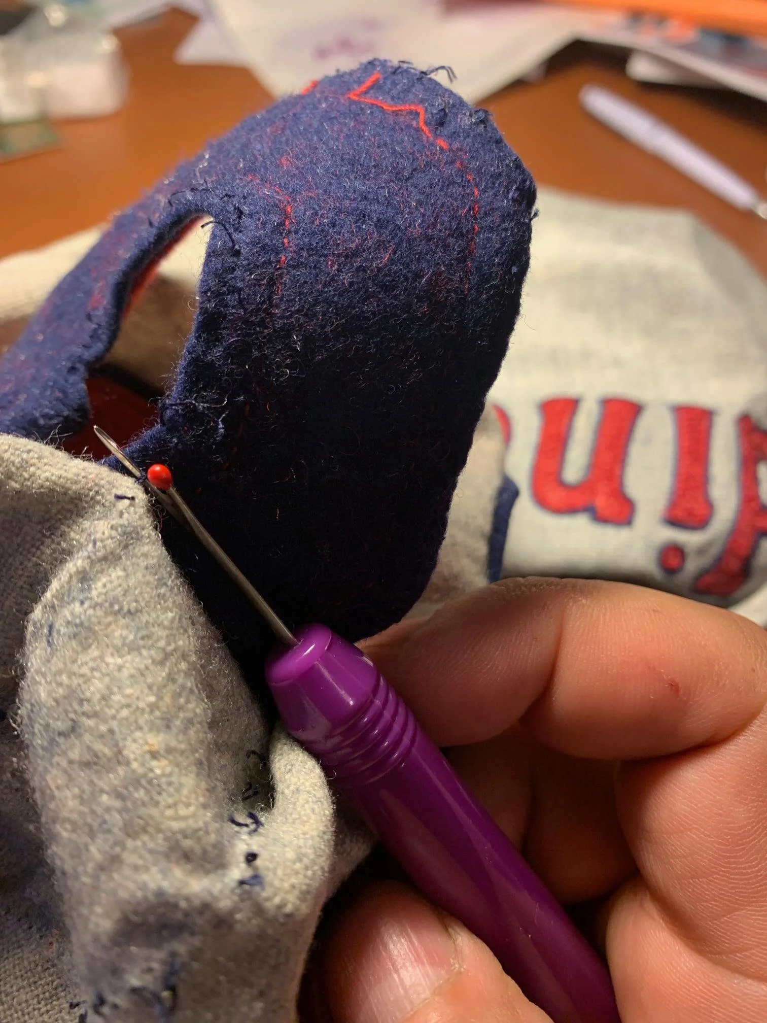 I received Dr. Kirsch’s permission to remove the back numbers so I could examine it more thoroughly. I did so, one careful stitch at a time.