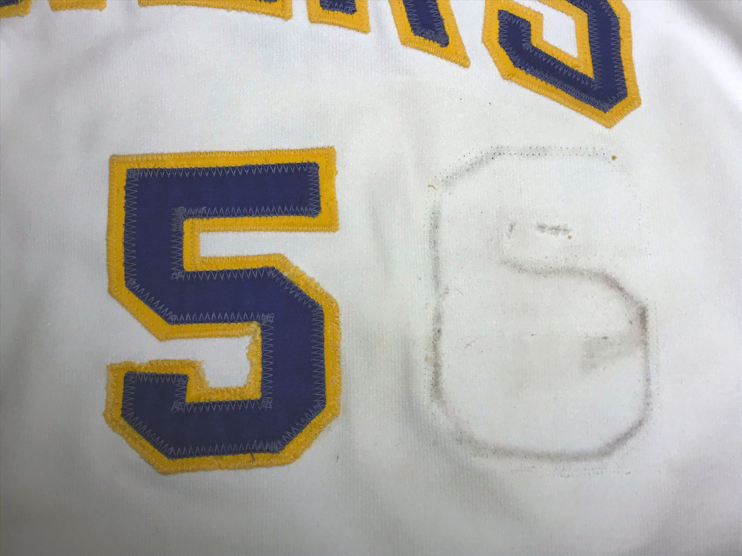 ..the front number removed. These dirty glue marks will come out with a high-pressure blast from the dry cleaning gun.