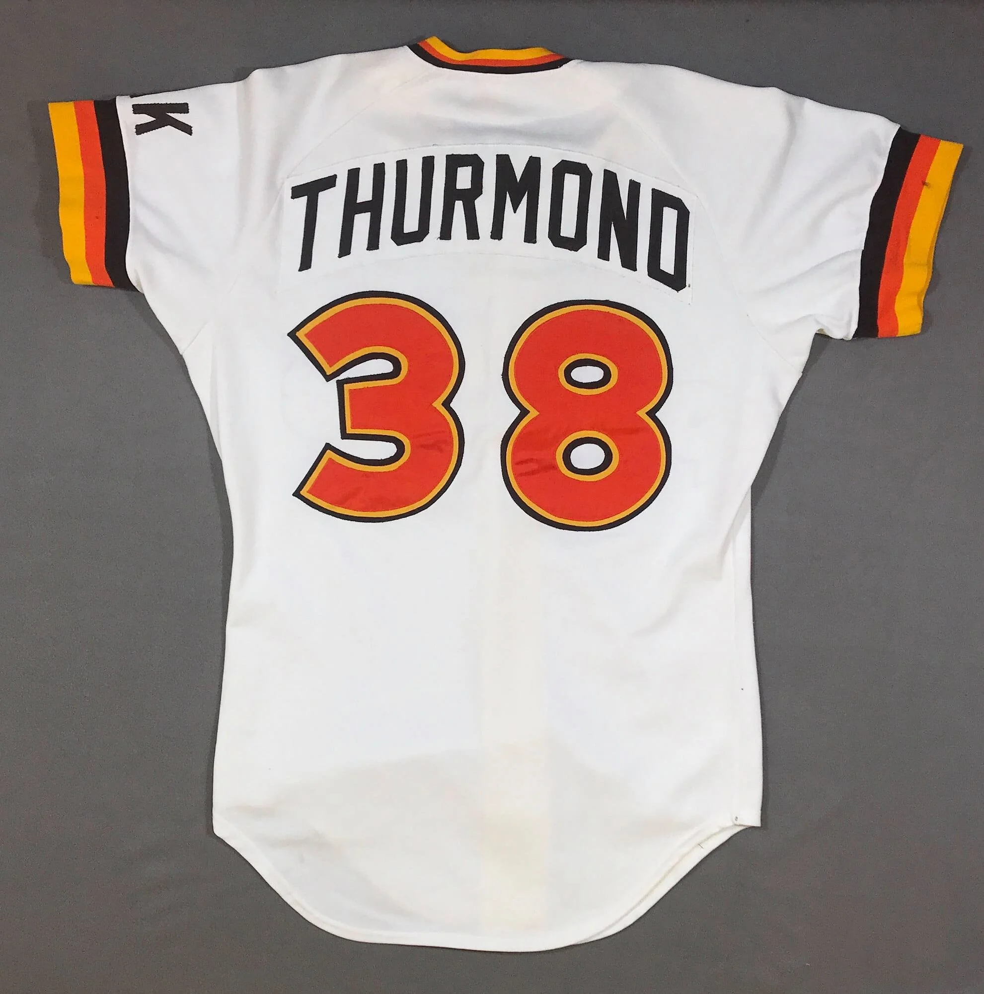 It may seem extreme, but for the most authentically-harmonious appearance, instead of making a new one, I harvested a "3" from another period Padres jersey and stitched it in place exactly over the shadows of the previously removed “8”.  The “3” was 