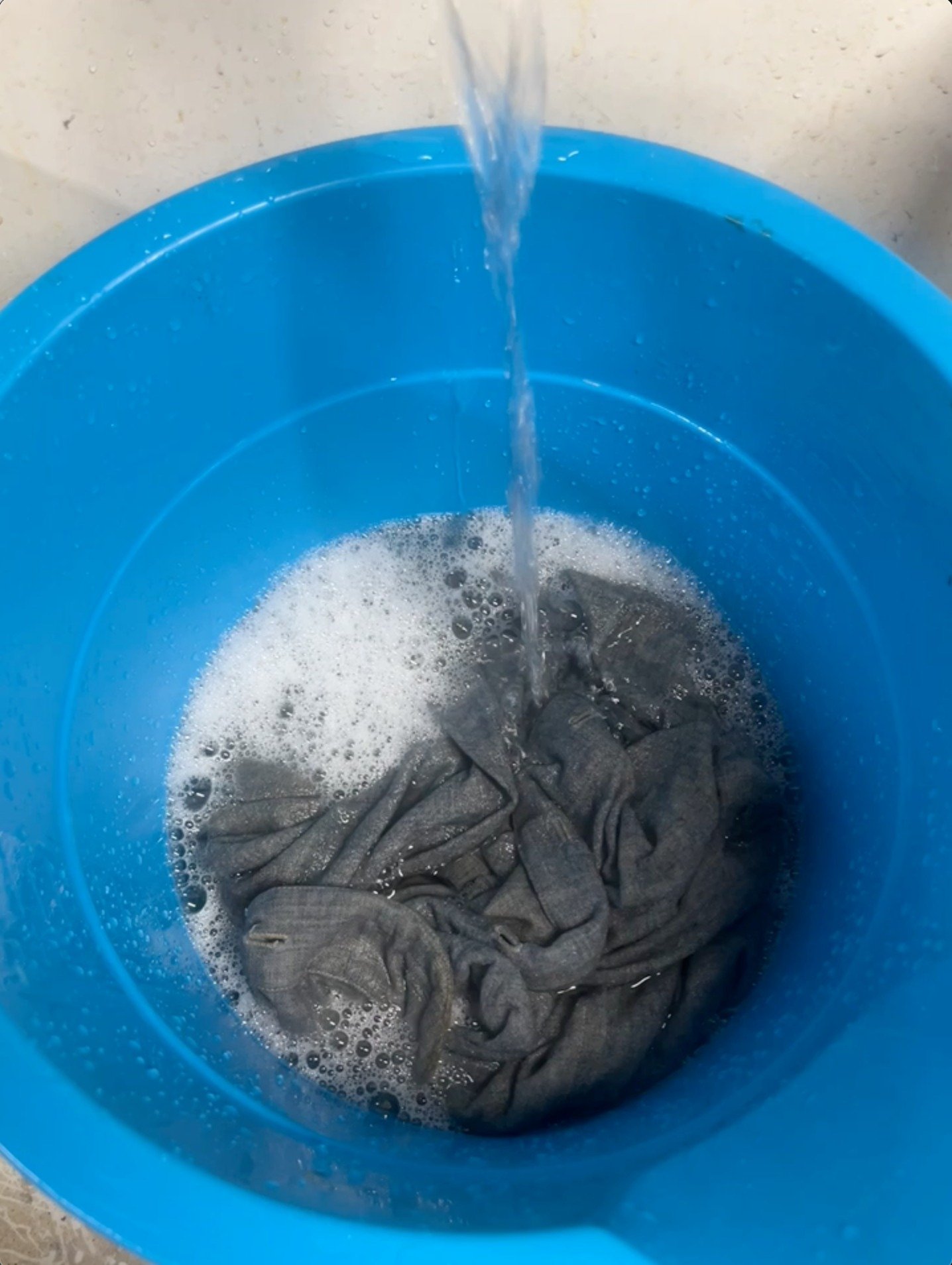 After the lettering was removed and the jerseys’ lineage determined, we had an important choice to make. They were very musty-smelling and dirty, dirty from being stored for many decades, but also dirty from being washed in shared water hundreds of t