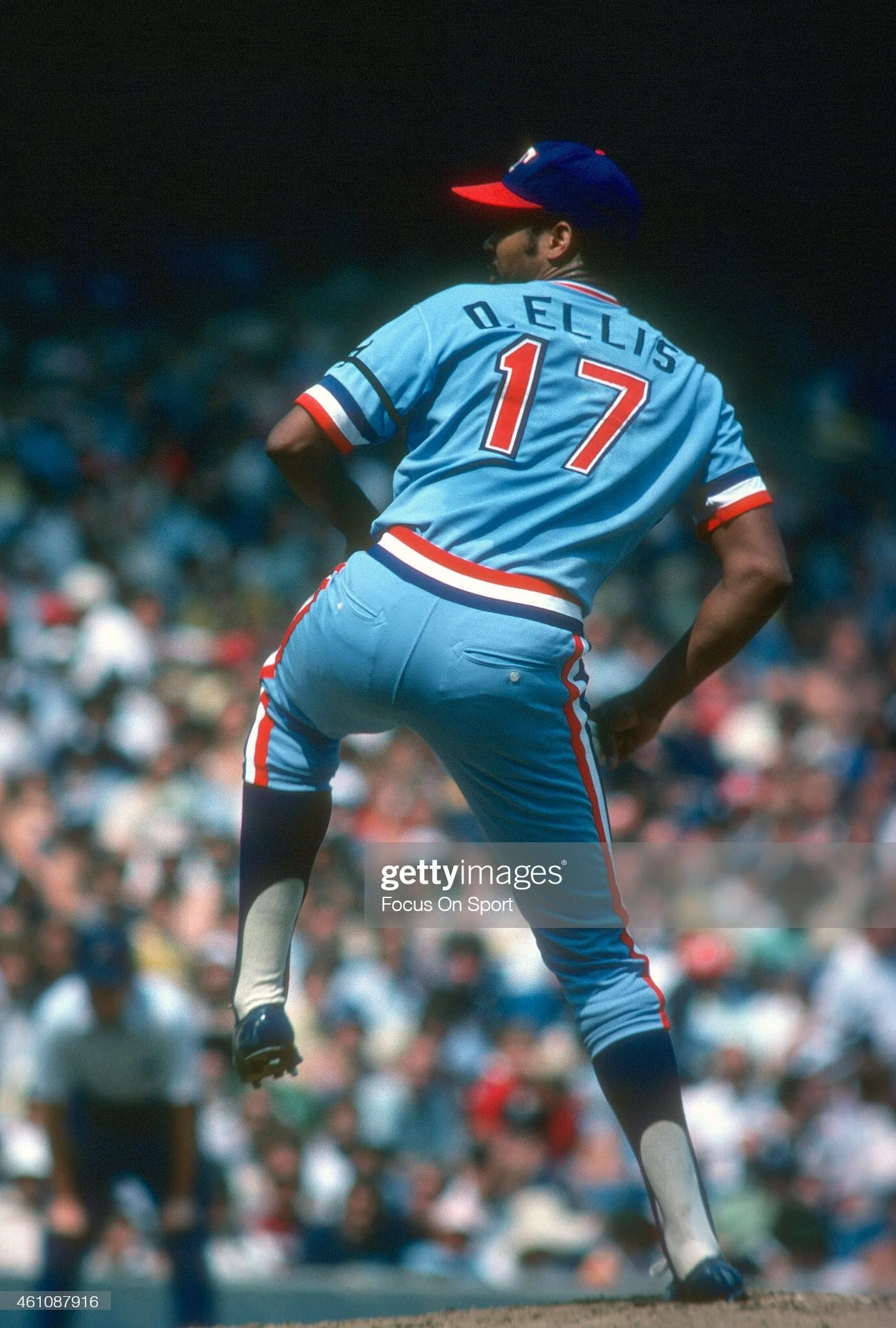 Proof: this photo from the prior season shows Ellis pitching and we can see that he had the first letter of his surname on his jersey!