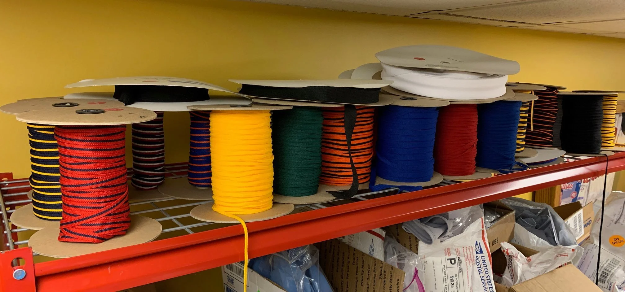 Normally, we turn to our cabinet of notions and odds and ends to see what is there… I have spools and spools of almost all the trim braid used by all the teams over the past 50 years. But this was different… a flannel jersey that was 60 years old, an