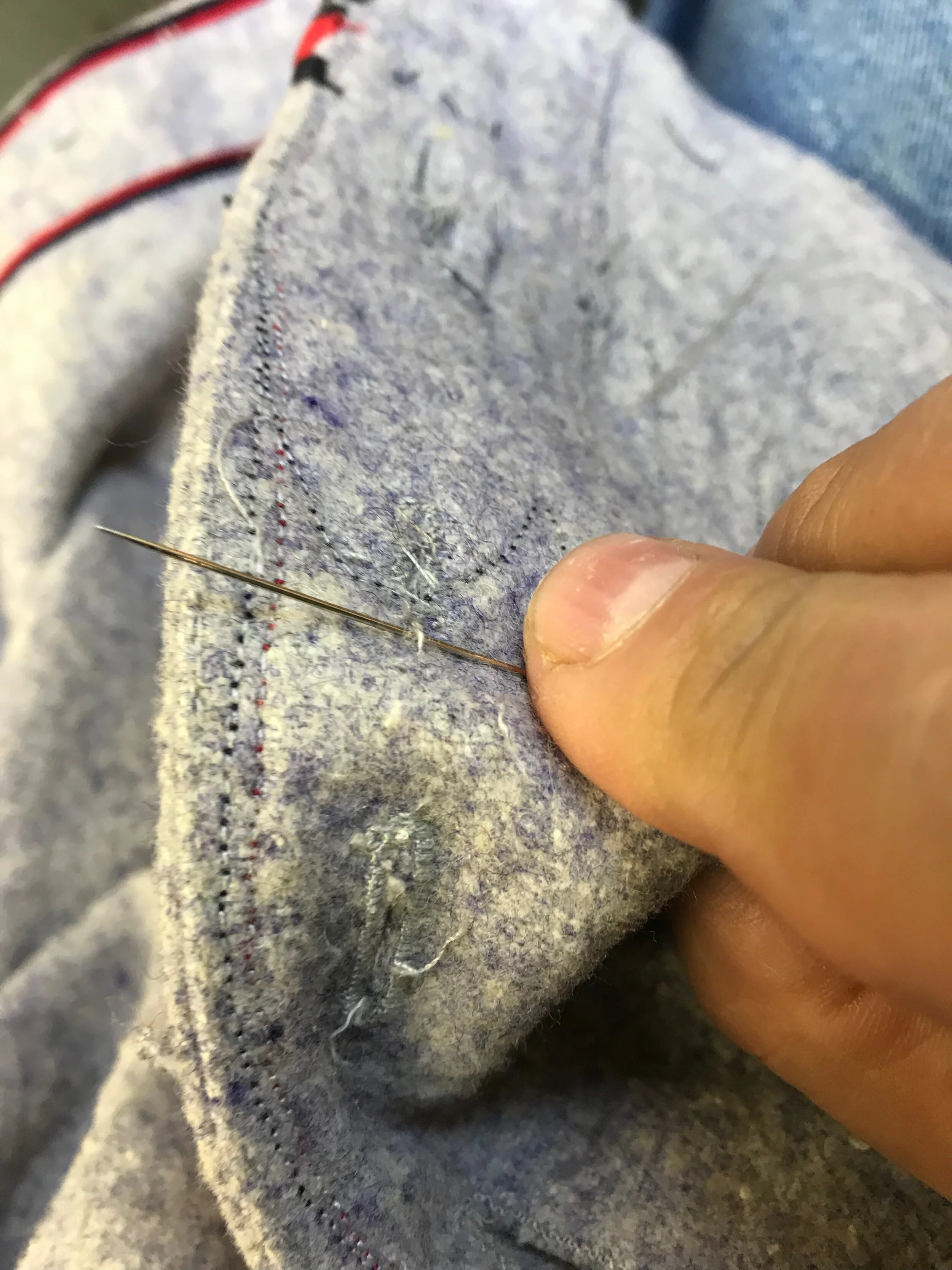 It may seem like a small thing, but I hand-sew the original buttonholes closed from the back. It will take a very sharp eye to see that they were ever there.