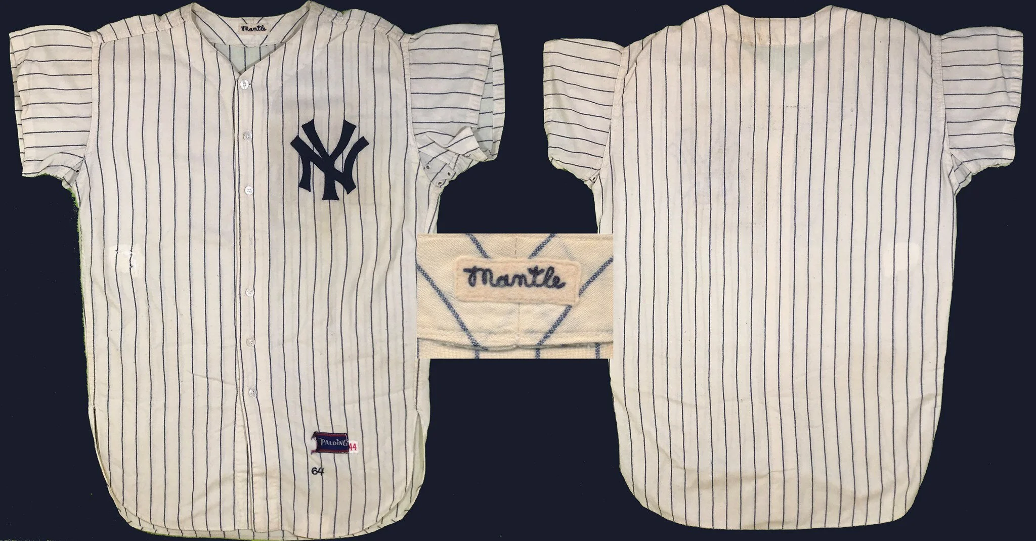 Here's how we received it. The "NY" on the front looked off and there were no numbers on the back, but Mantle’s name was embroidered in the collar. The jersey was a Spalding, year-tagged as 1964.