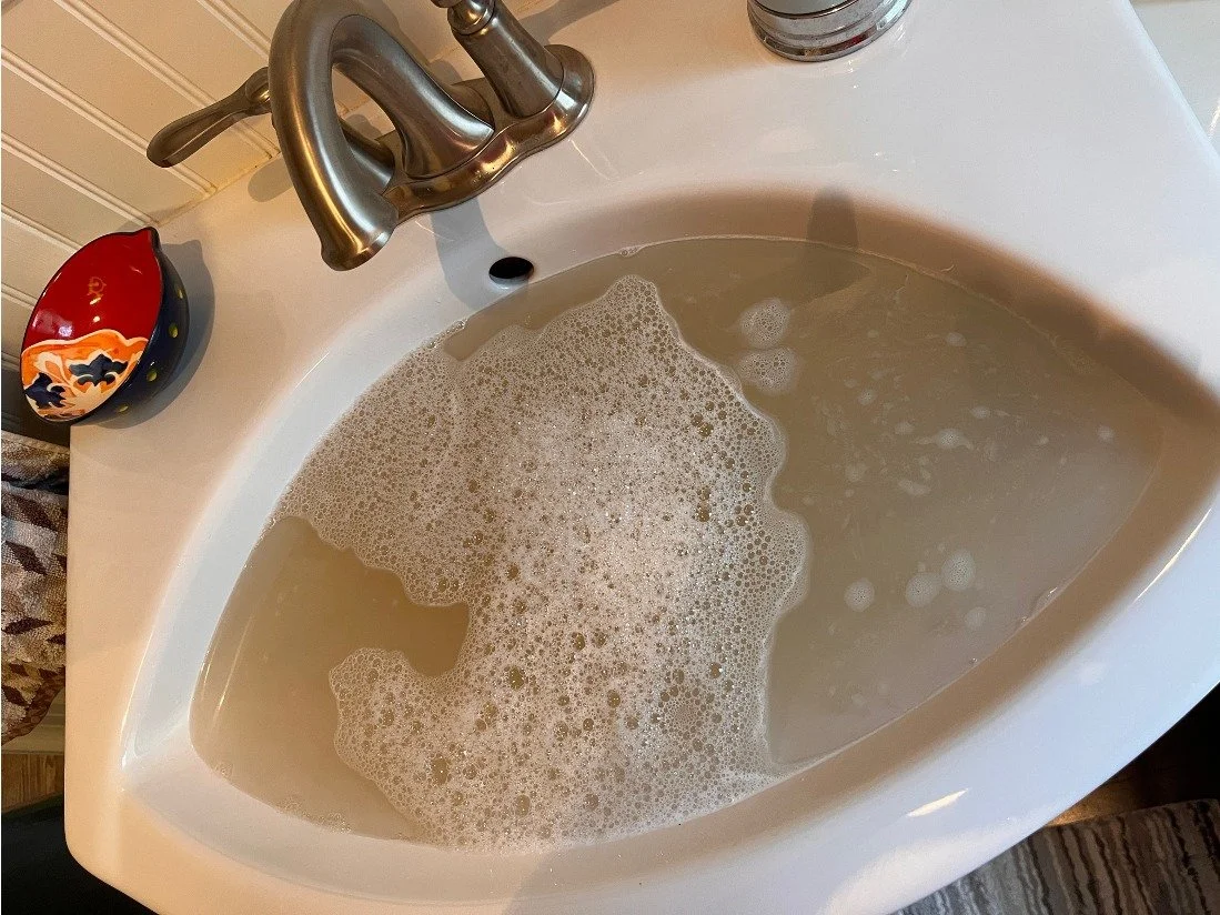 Mark had told me that he had washed the jersey before he sent it to me. Nevertheless, this is what my hand-washing in Oxiclean generated. I then hand scrubbed the stained fabric with a mixture of Oxiclean paste (powder barely dissolved in a little wa