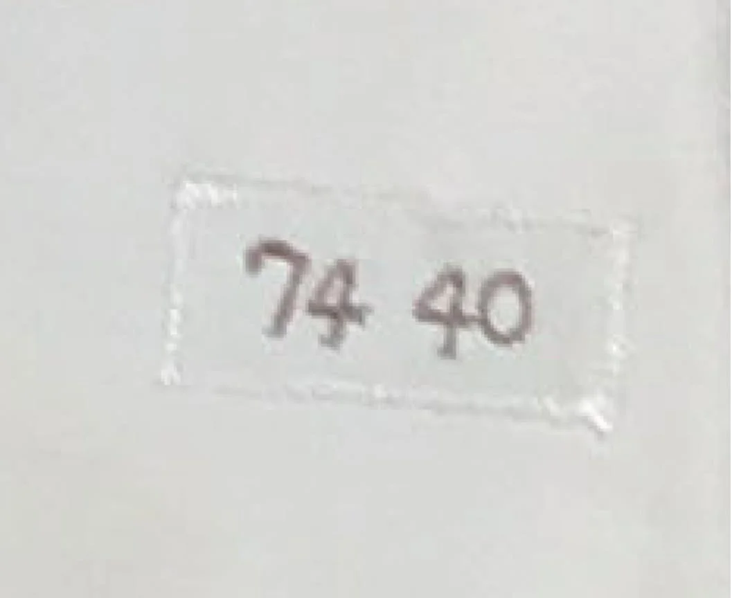 This grainy photo of the tagging was what I needed to see. Minor league teams generally did not year tag their jerseys, rather, the jerseys came to them already tagged from the MLB parent that had used them previously.

This tagging nomenclature matc