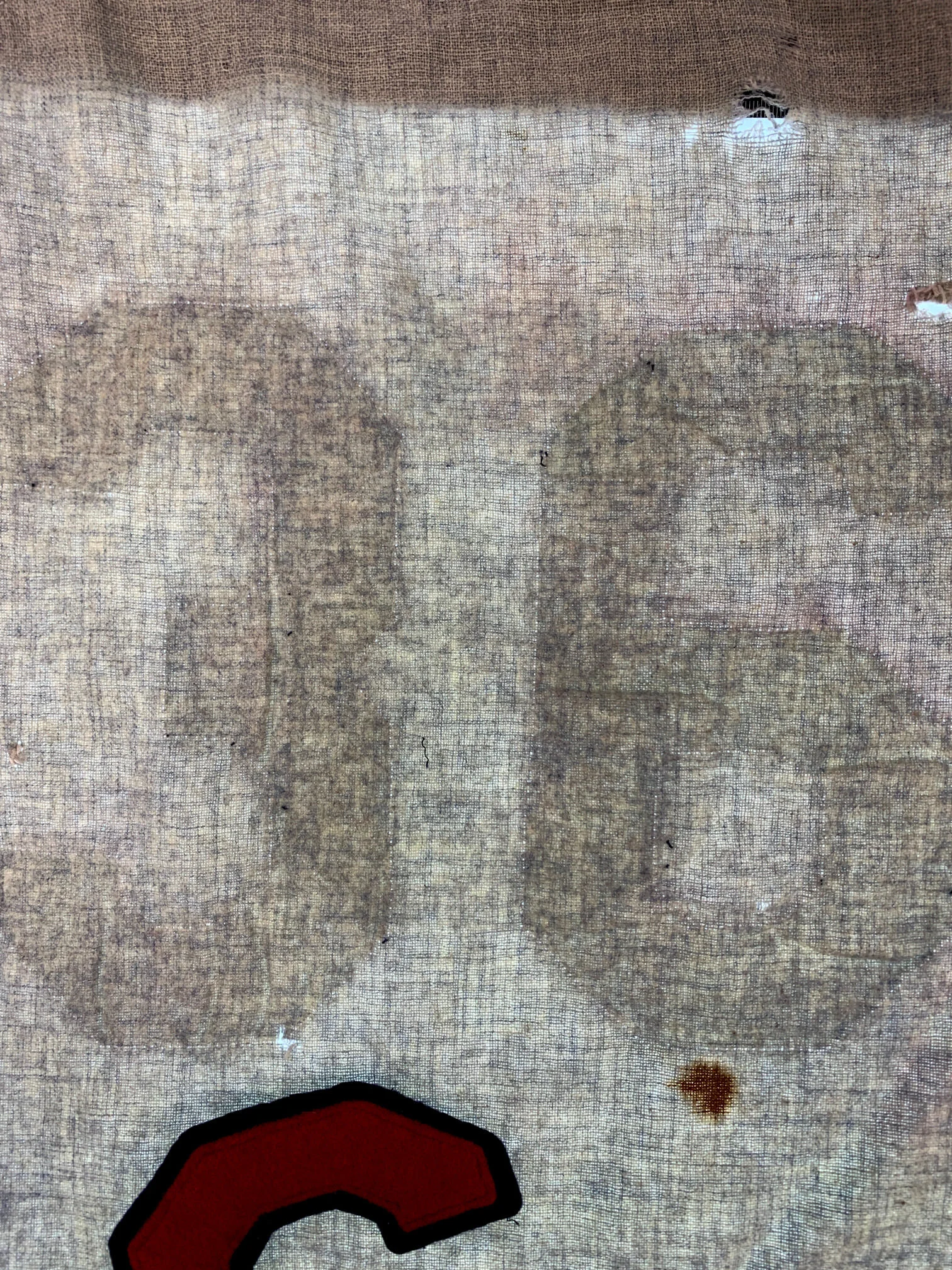 Invisible to the naked eye, I used the light table to coax out evidence of a slightly darkened area in the center of the back. It was indeed a 6! But as I compared the fuzzy size and shape, as well as the placement of the darker area, I saw that it d