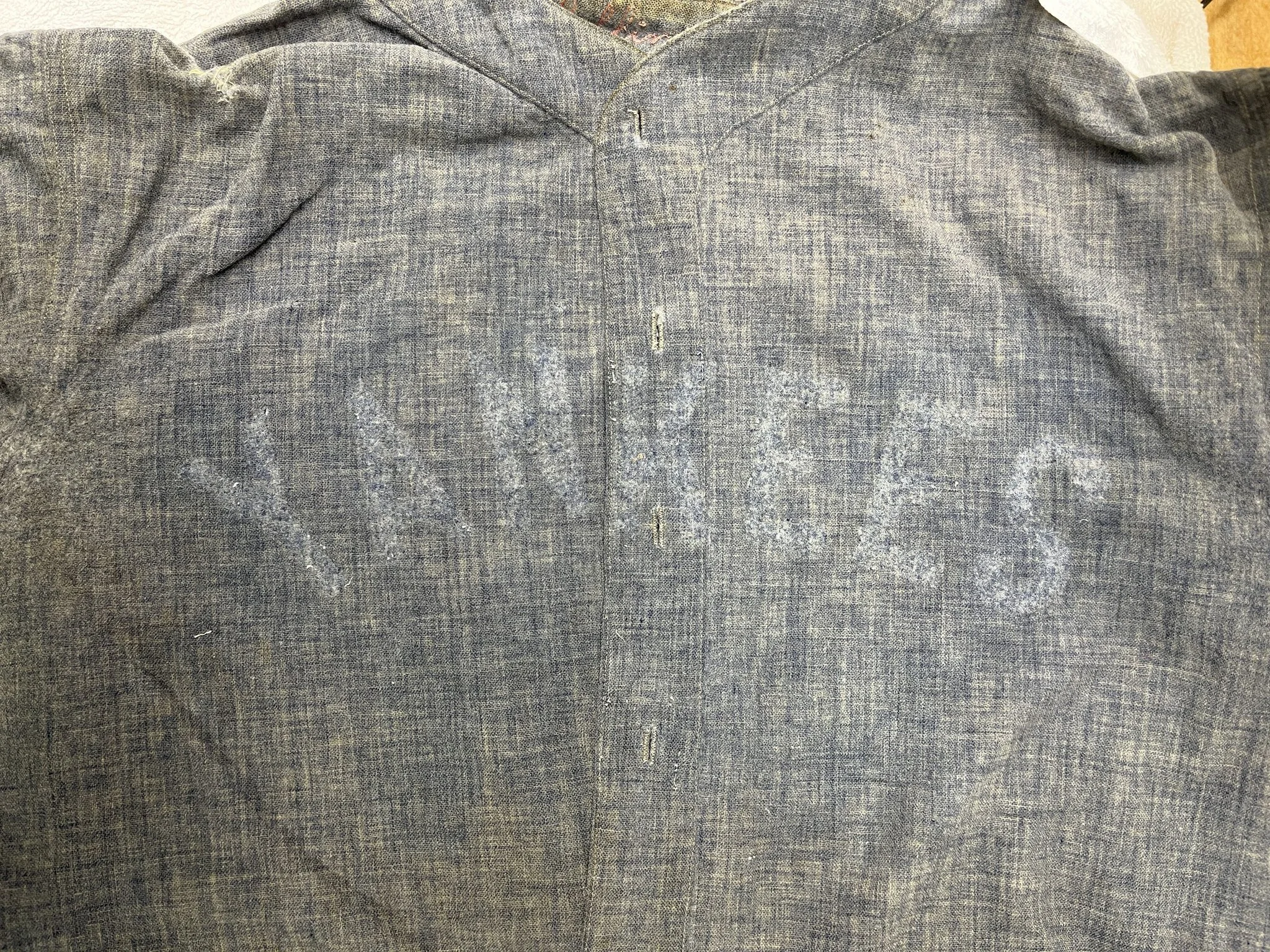 Do you believe in ghosts? Here is where it gets really creepy… when soaking wet, the ghostly image of the original front team crest from almost 100 years ago returns to view, appearing as glowing brighter than the surrounding fabric.