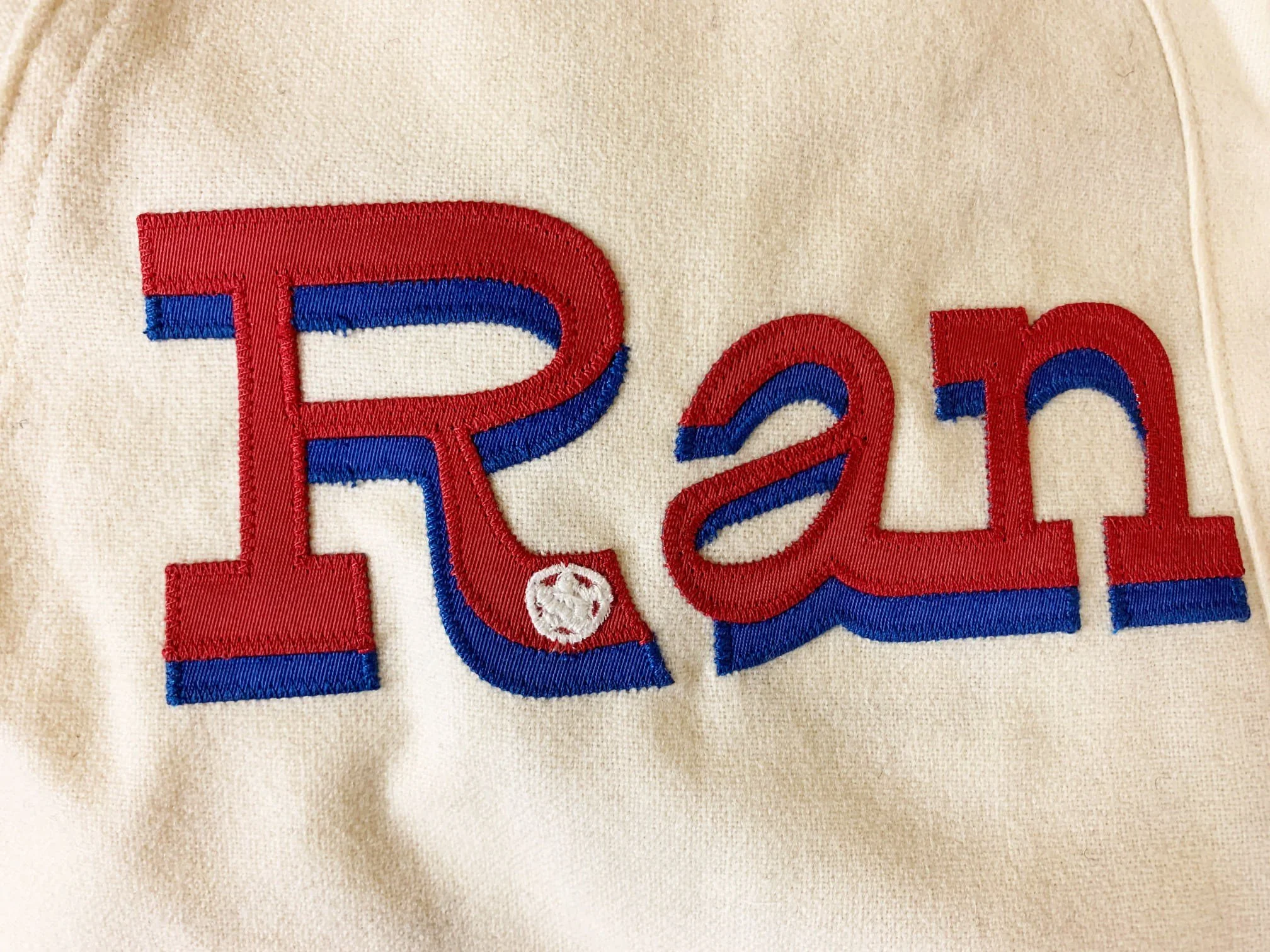 The tiny hand embroidered white circle with the star in it appeared on a different spot on the spring training issue compared to the regular season uniforms.