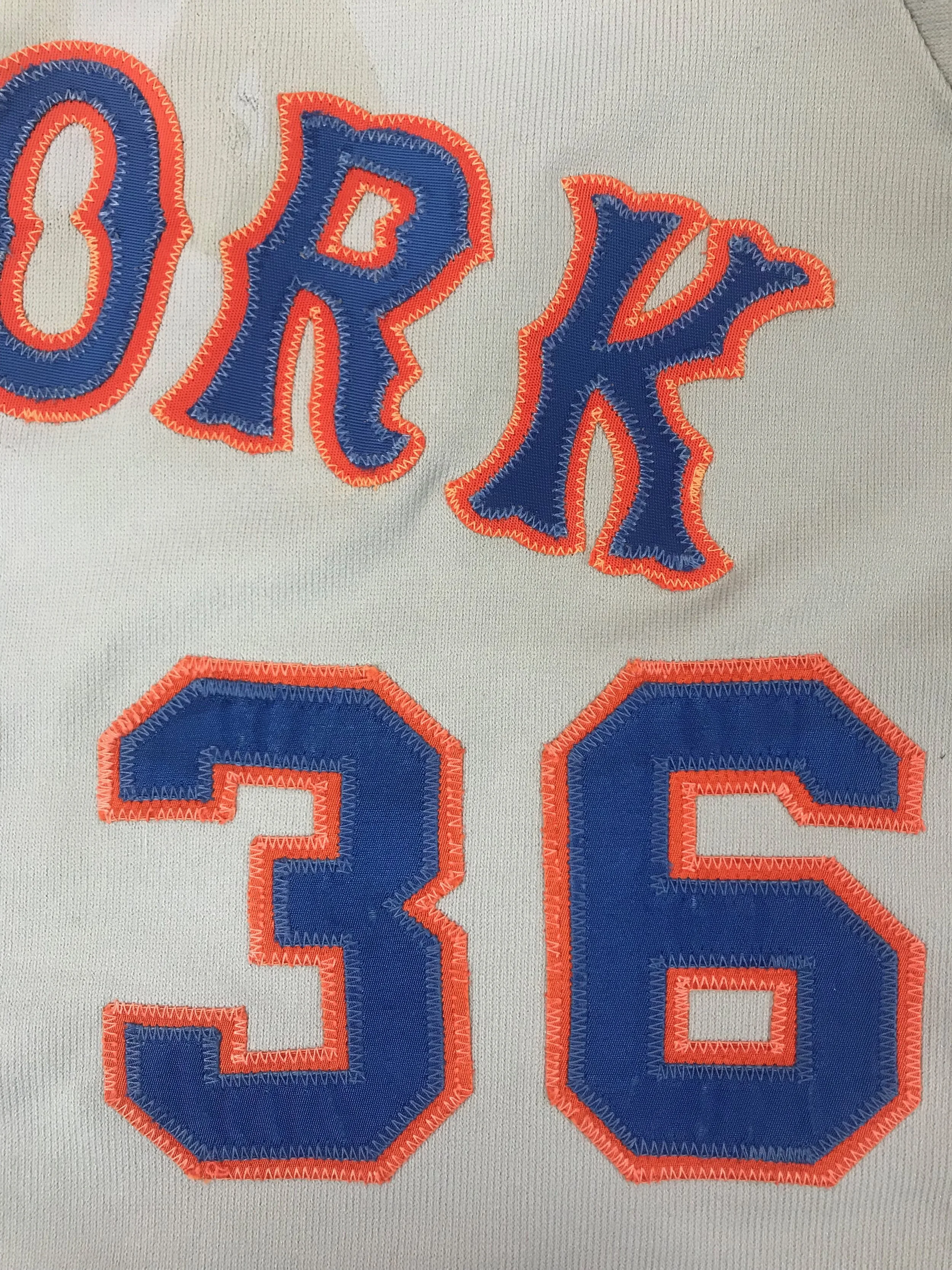 Here is the old stitching next to the new. I am very pleased with the match of the fabric colors, lack of sheen and the thread / stitching match. The best compliment is that you'd never notice the difference between new and old. Had I used new, shiny