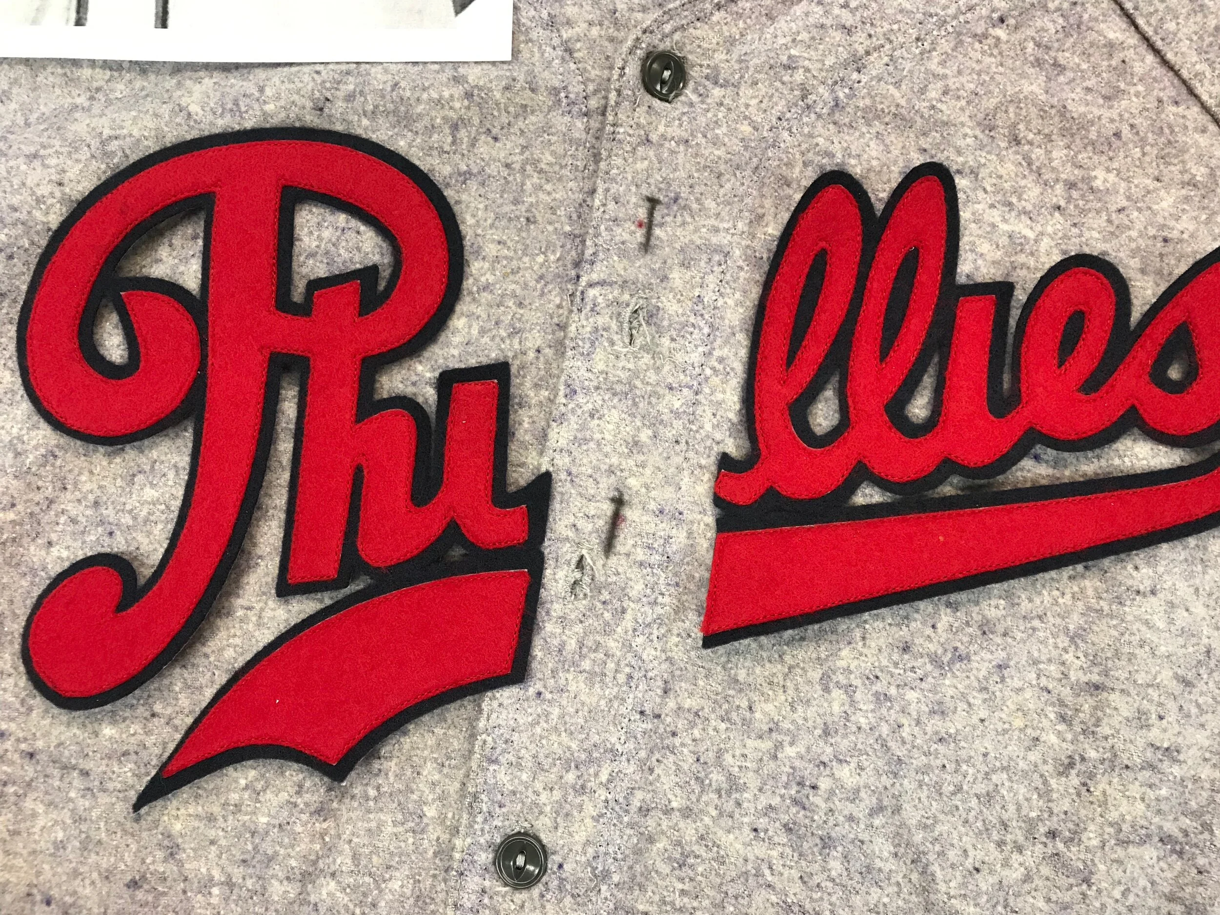 I have marked the marked the exact location of the two new buttonholes with soft lead pencil. Compare them to the original buttonhole locations.