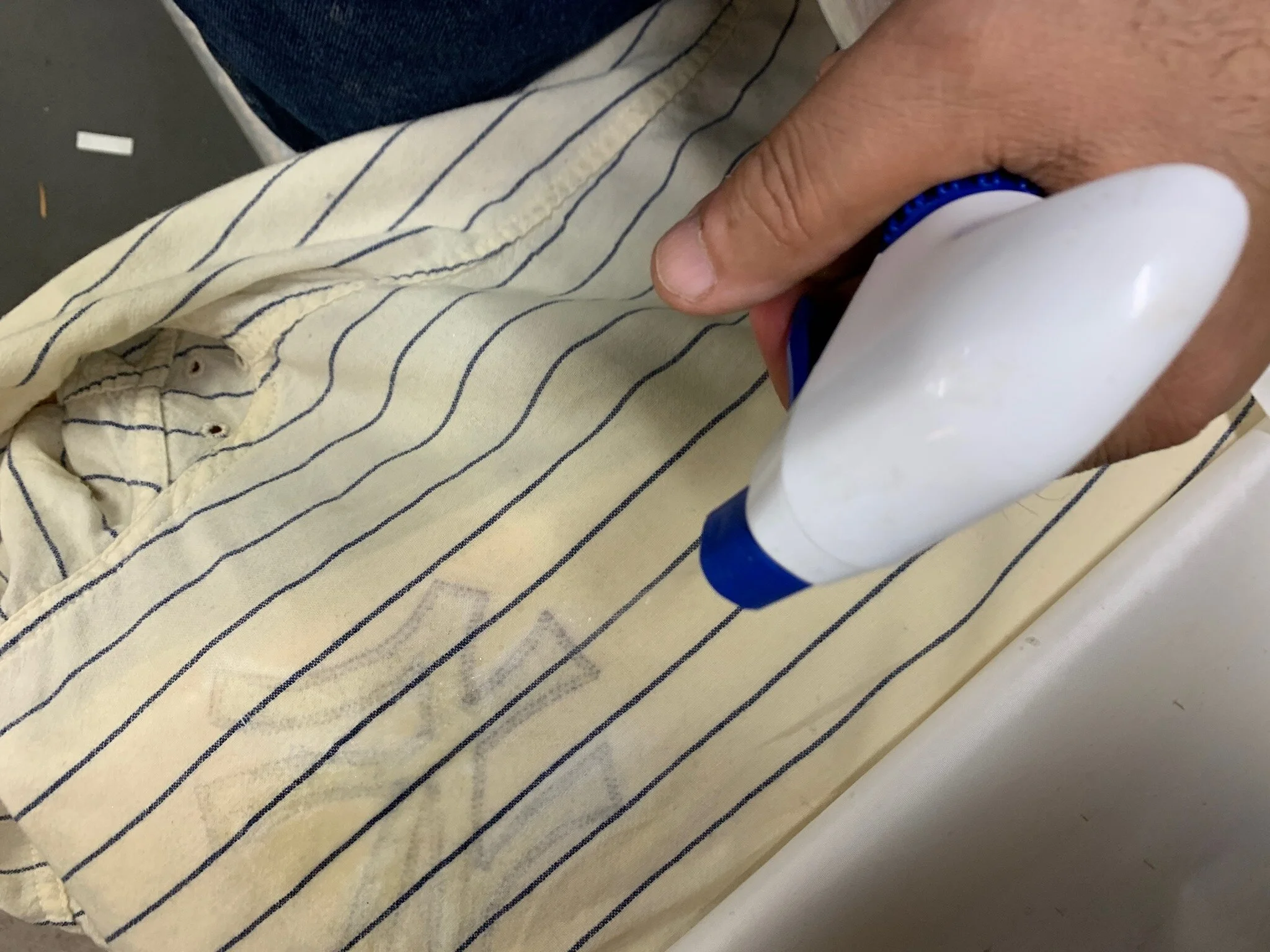 The darkened glue marks mostly came out of the fabric with a careful application of dry- cleaning chemicals. I worked gently to try to remove the blue staining, but succeeded only in lightening it slightly. This can not overly concern me: I believe t