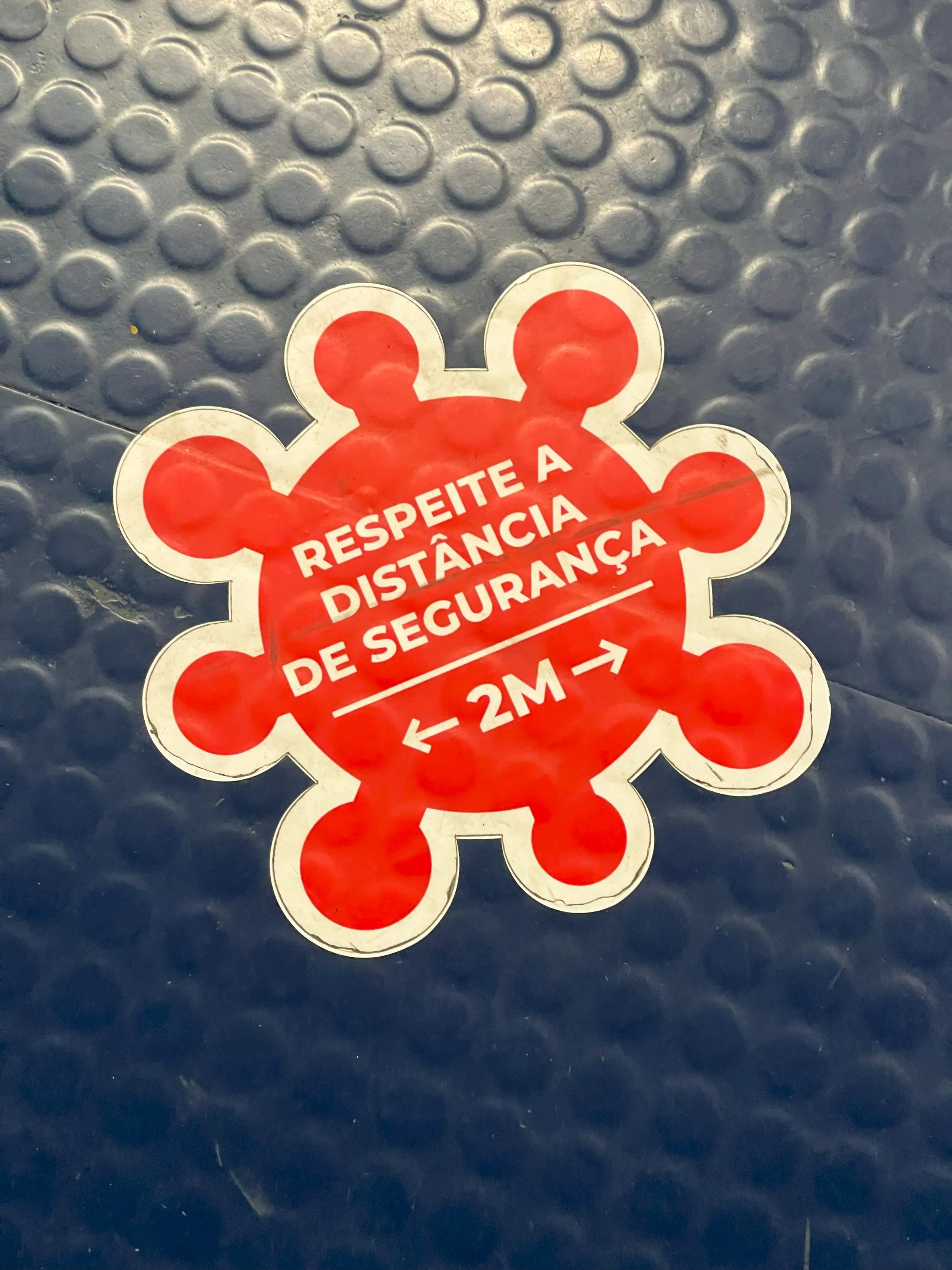 "Respeite a distância segurança (Keep a safe distance)" Virus Sticker, Sete Rios Train Station
Lisbon, Portugal - July 29th