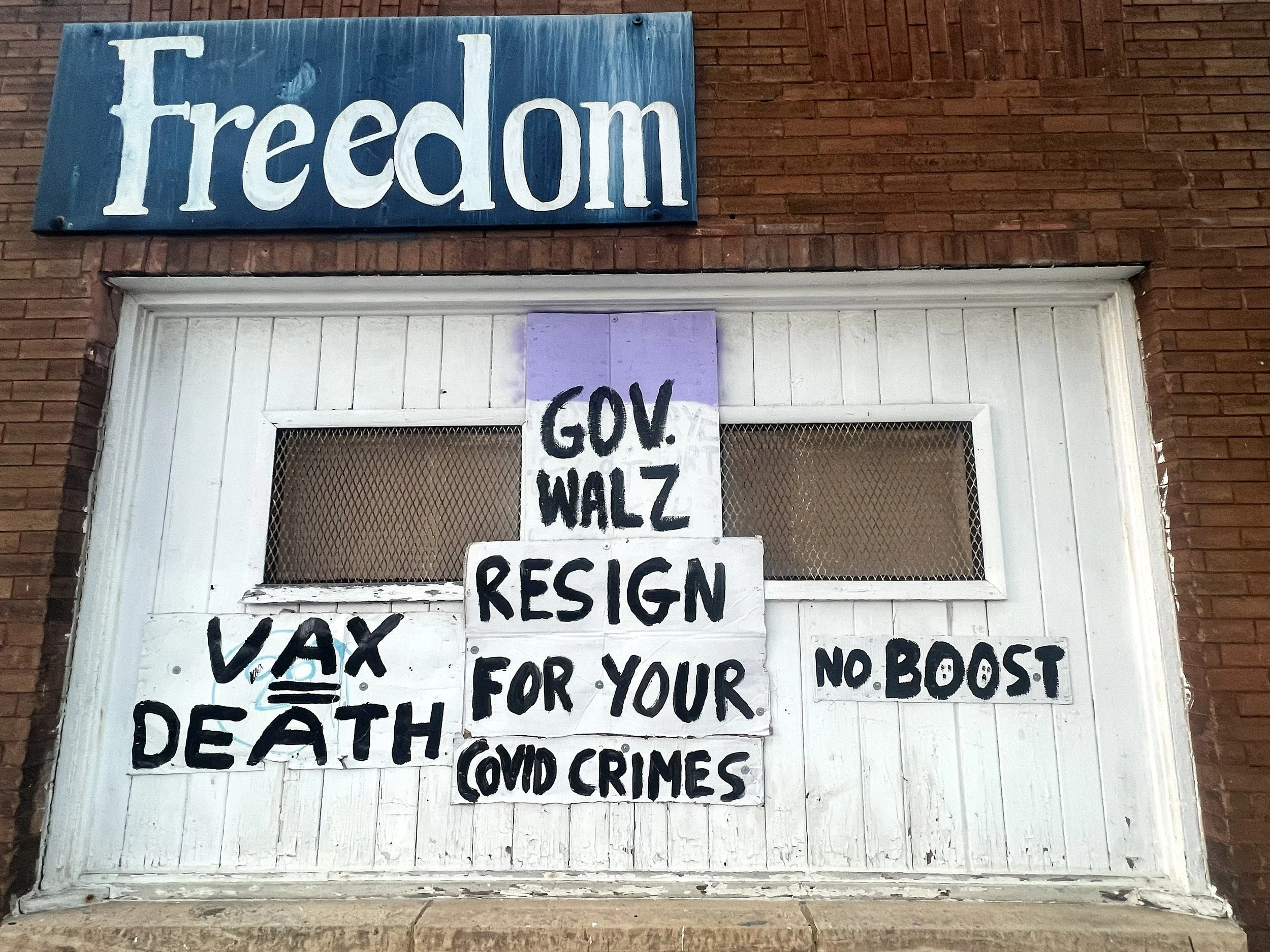 "COVID Crimes" Handpainted Anti-Vax Conspiracy Signs, North Minneapolis, MN - September 2024