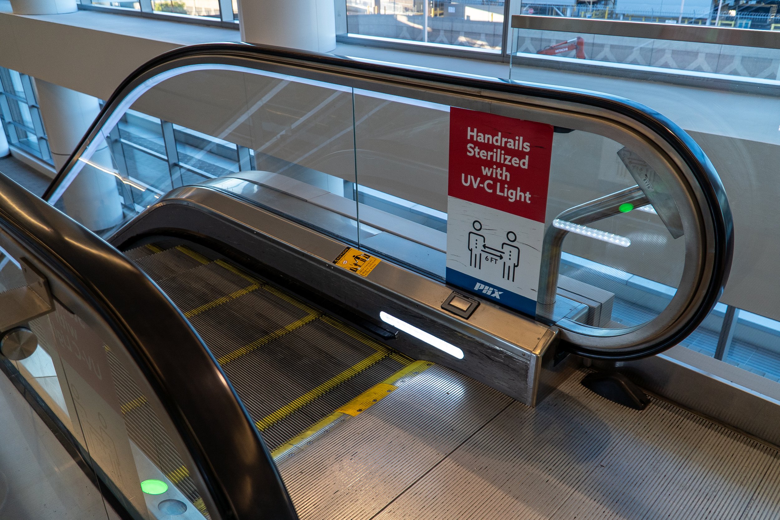 "Handrails Steralized with UV-C Light" Escalator Adhesive Notice Phoenix Airport, AZ October 16th
