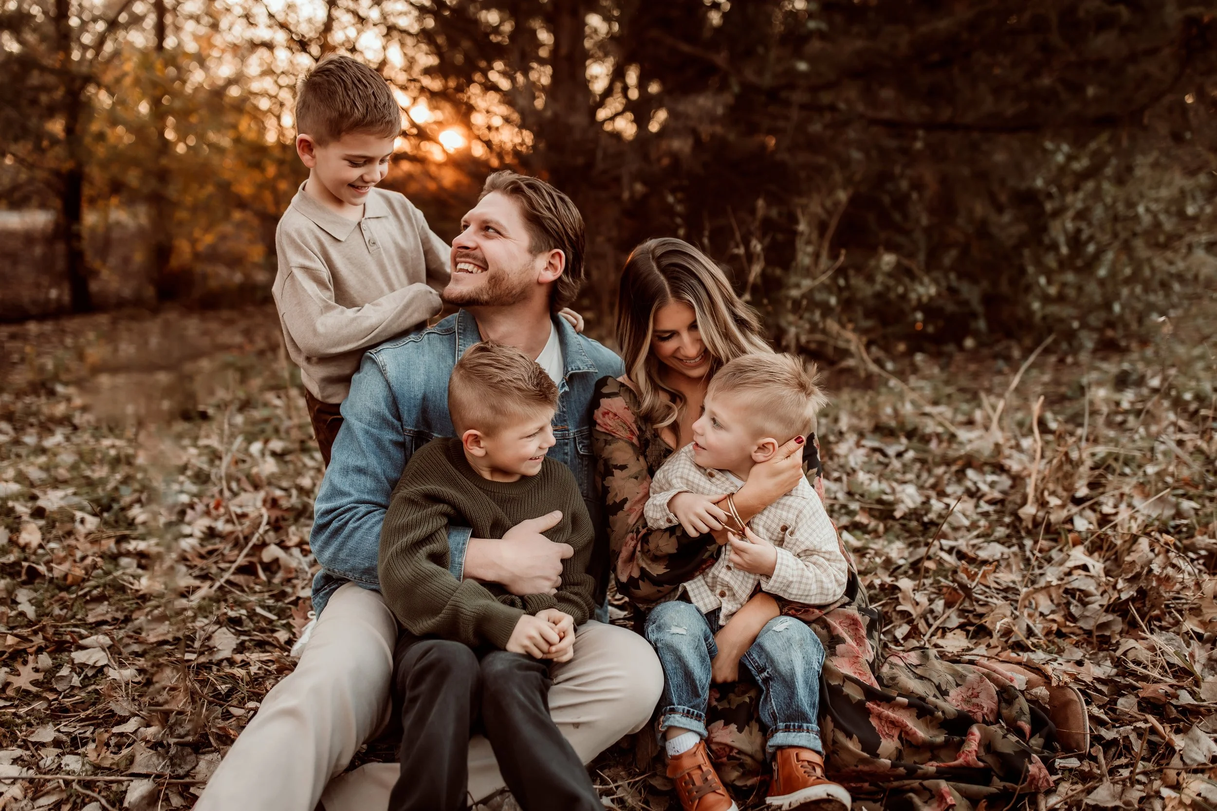 Candid family photography in Wichita featuring laughing toddlers