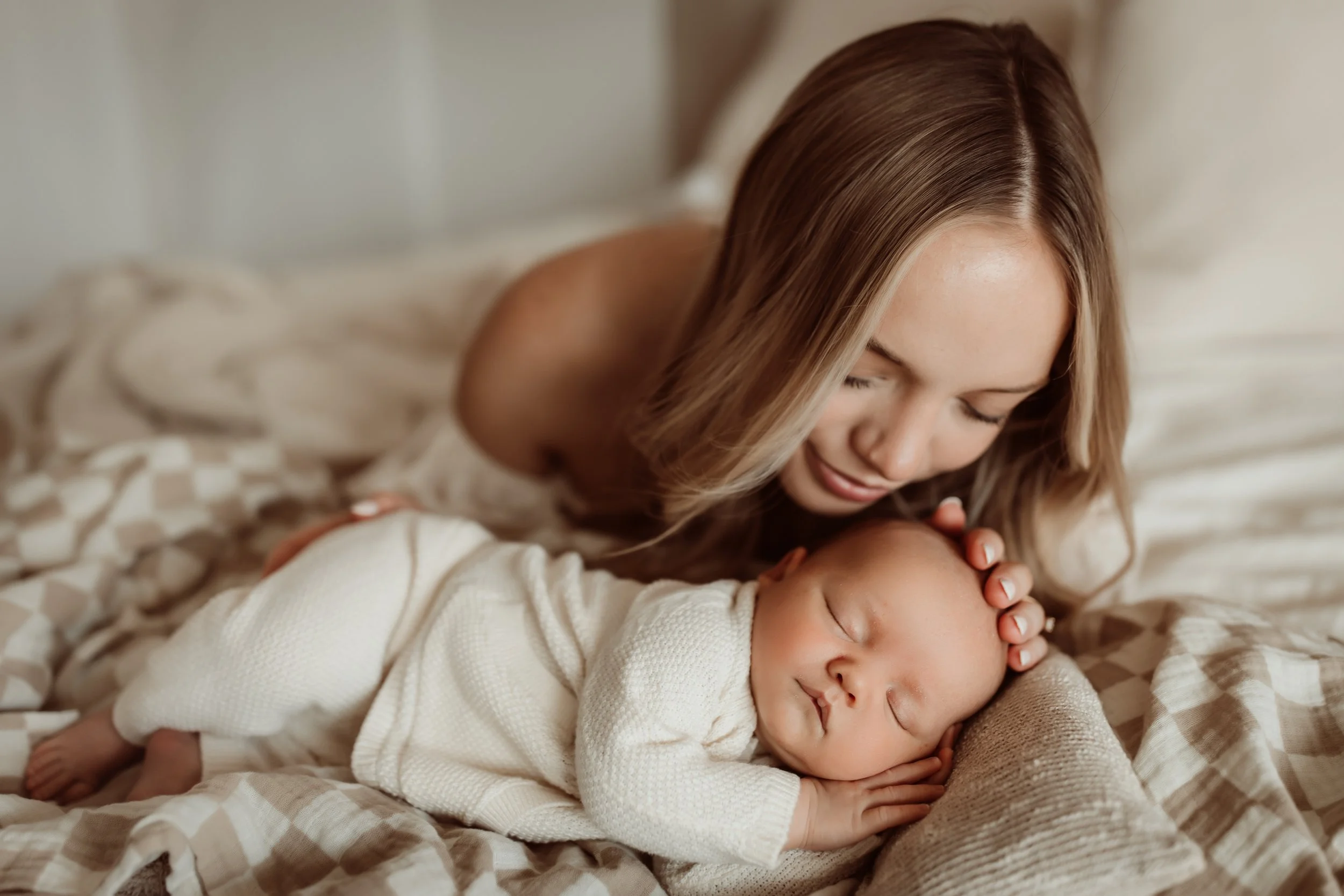 Wichita KS newborn session focused on family connection and love