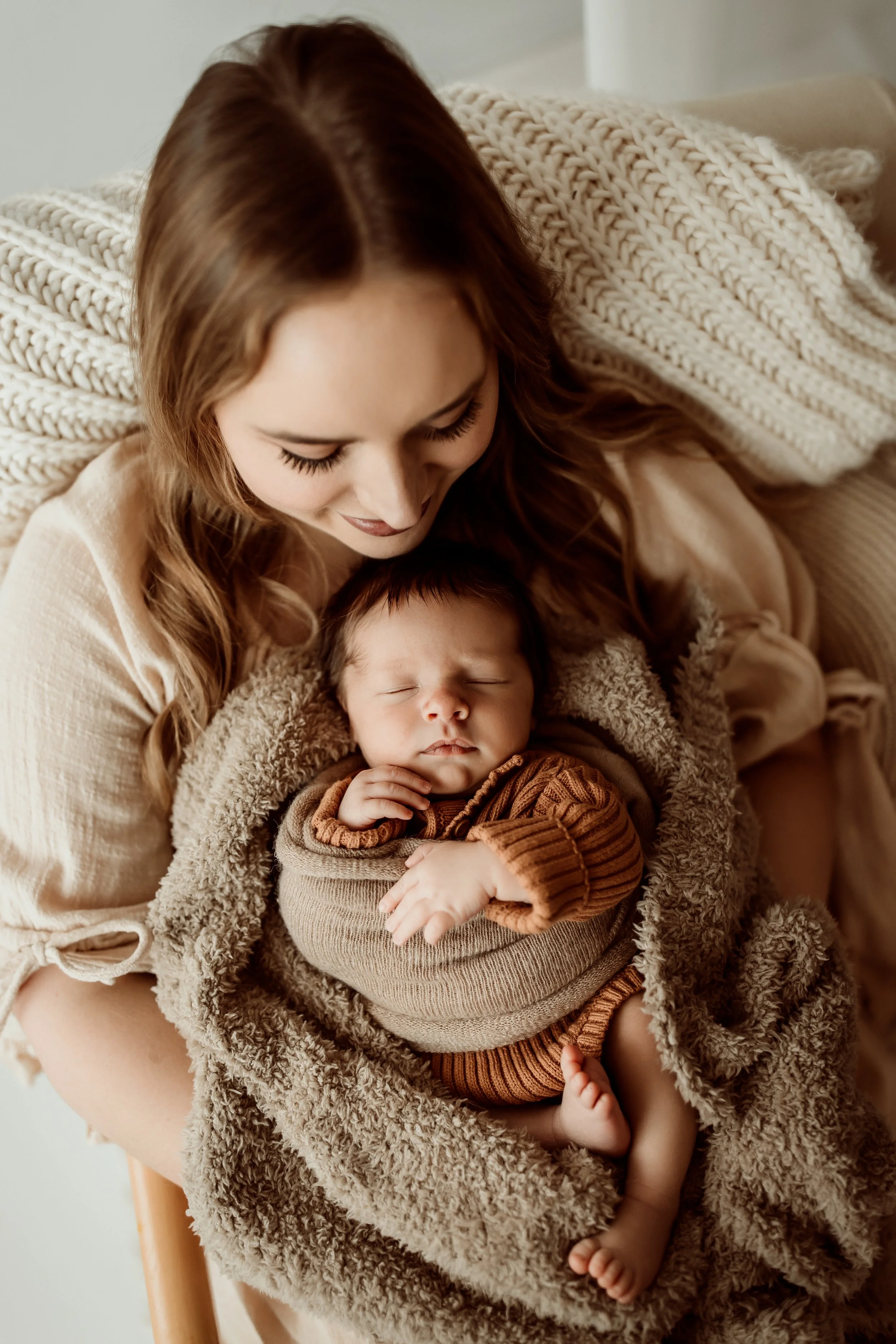 Natural light newborn session in a bright and airy Wichita home