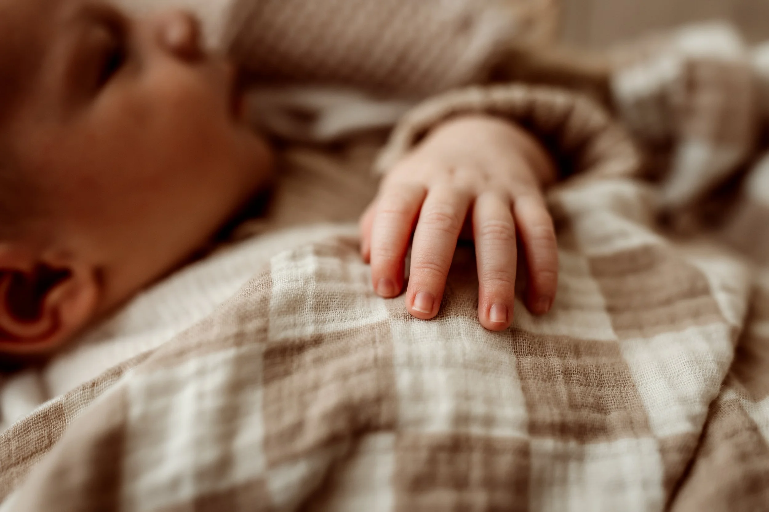Quiet and serene newborn photography in a natural Wichita setting