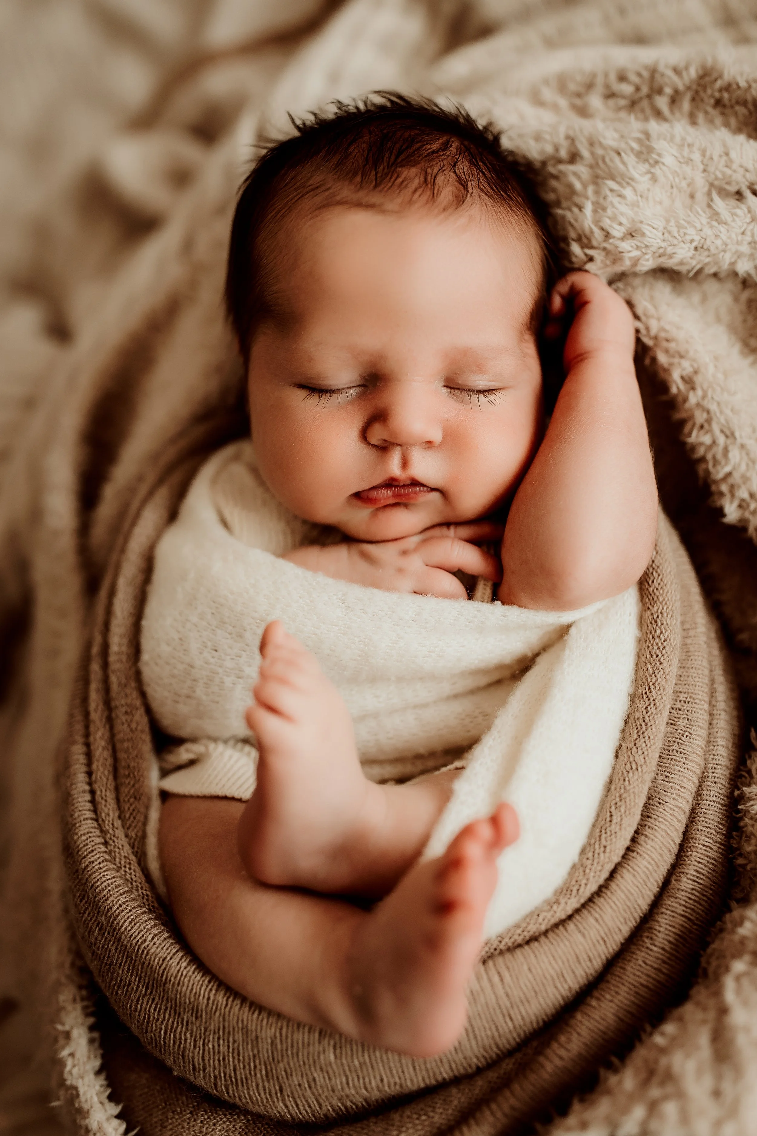 Classic and timeless newborn portrait in a Wichita photo studio