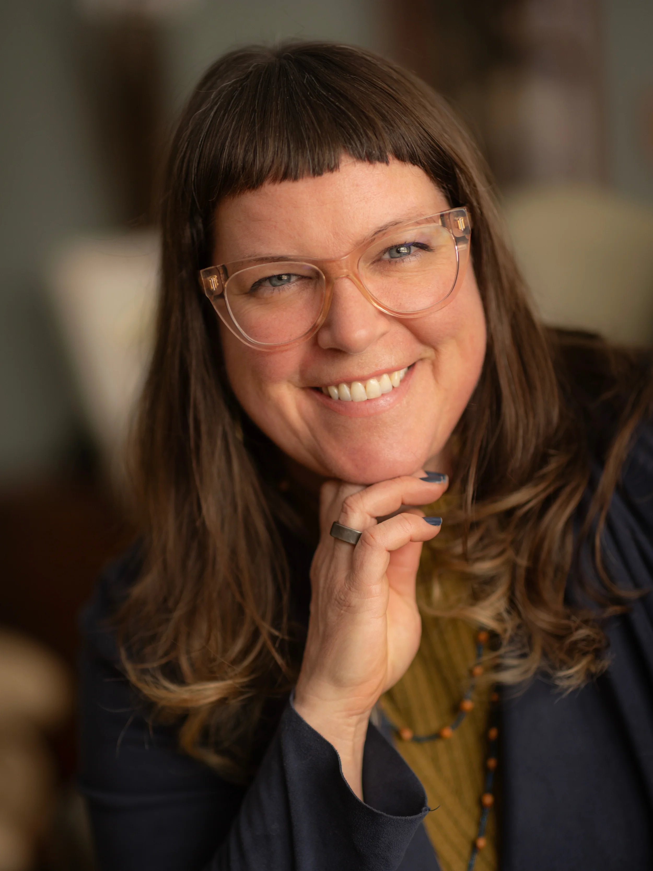 smiling woman with glasses