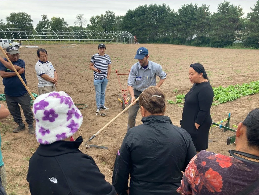 Sam Teaching Farmers.jpg
