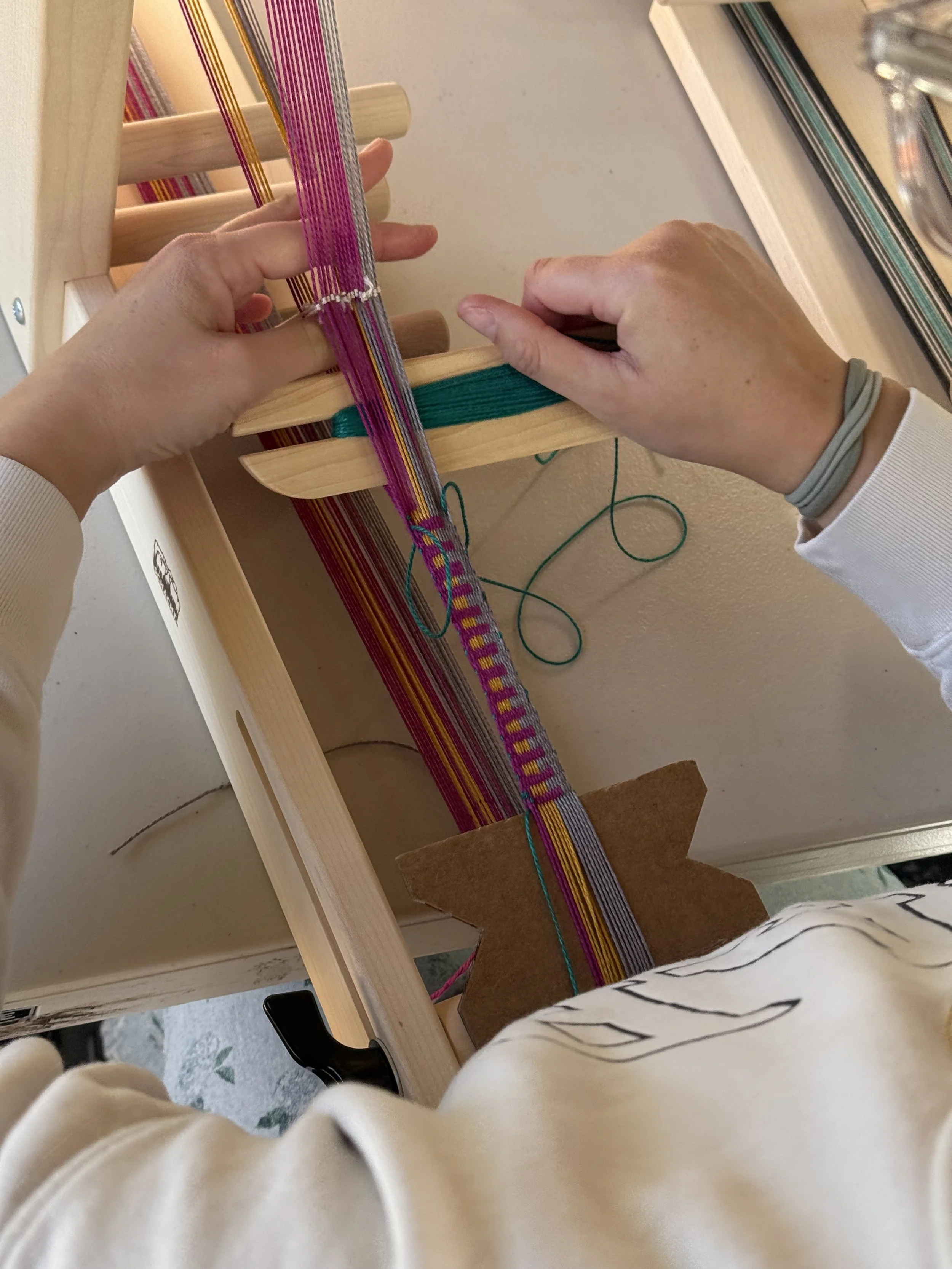 weaving on an inkle loom