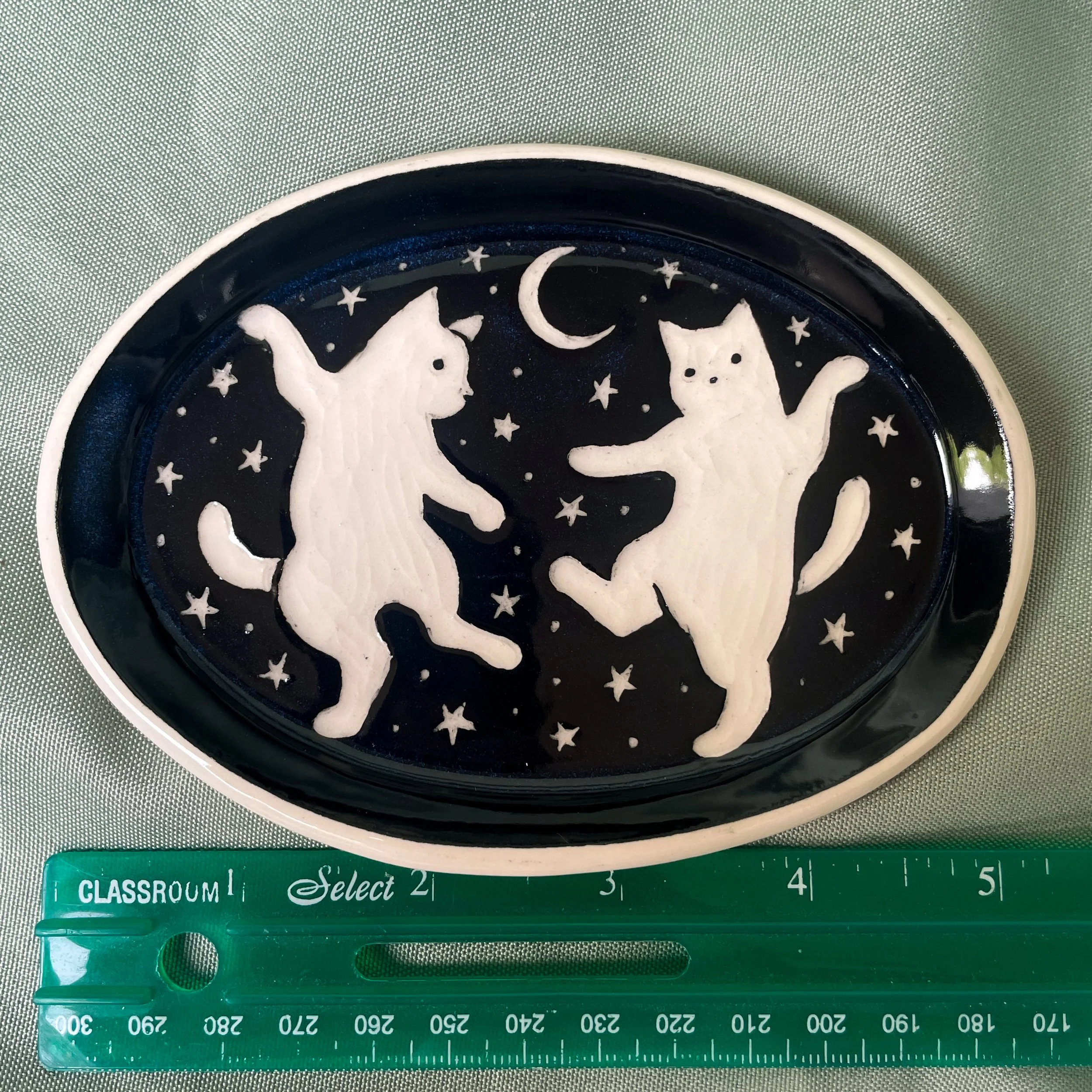 oval trinket dish dancing cats ruler.JPEG