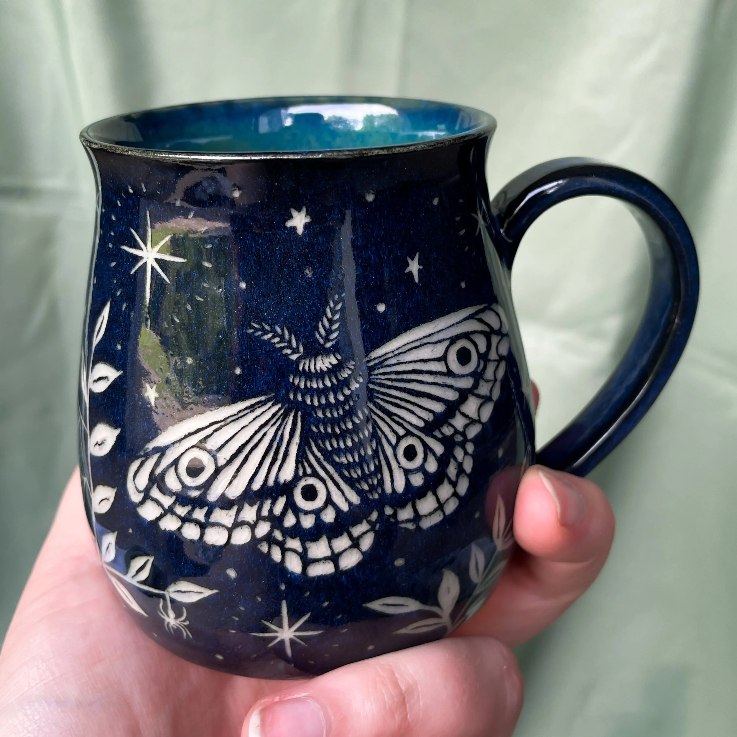 moth mug a held up 2.JPEG