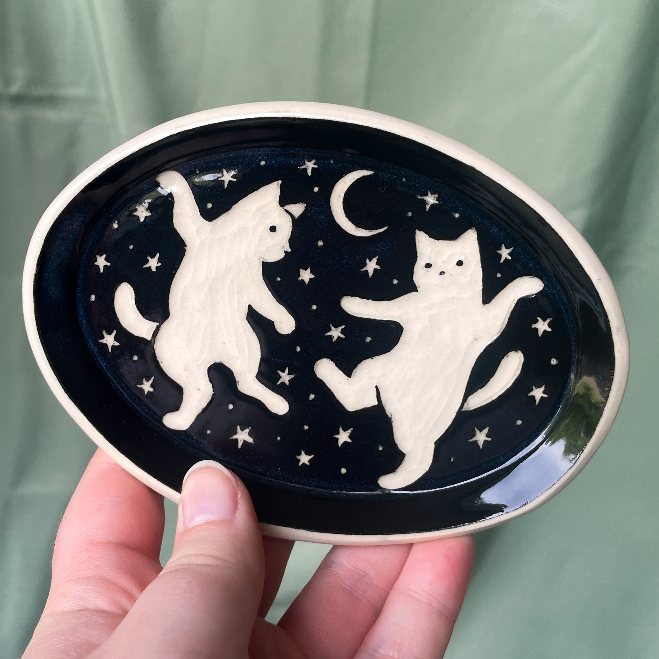 oval trinket dish dancing cats held up.JPEG
