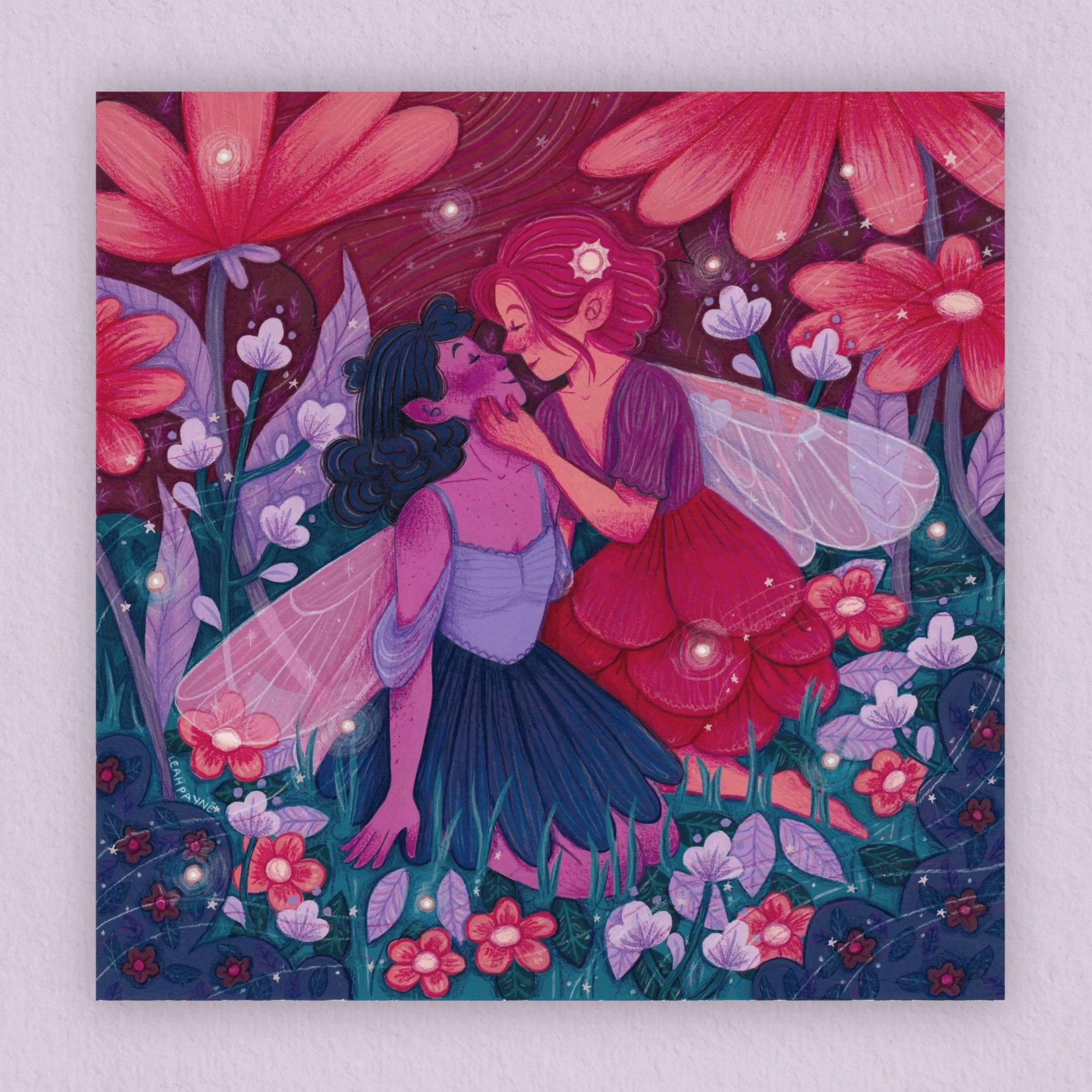 a gouache print of two lesbian fairies carressing in a field of flowers.