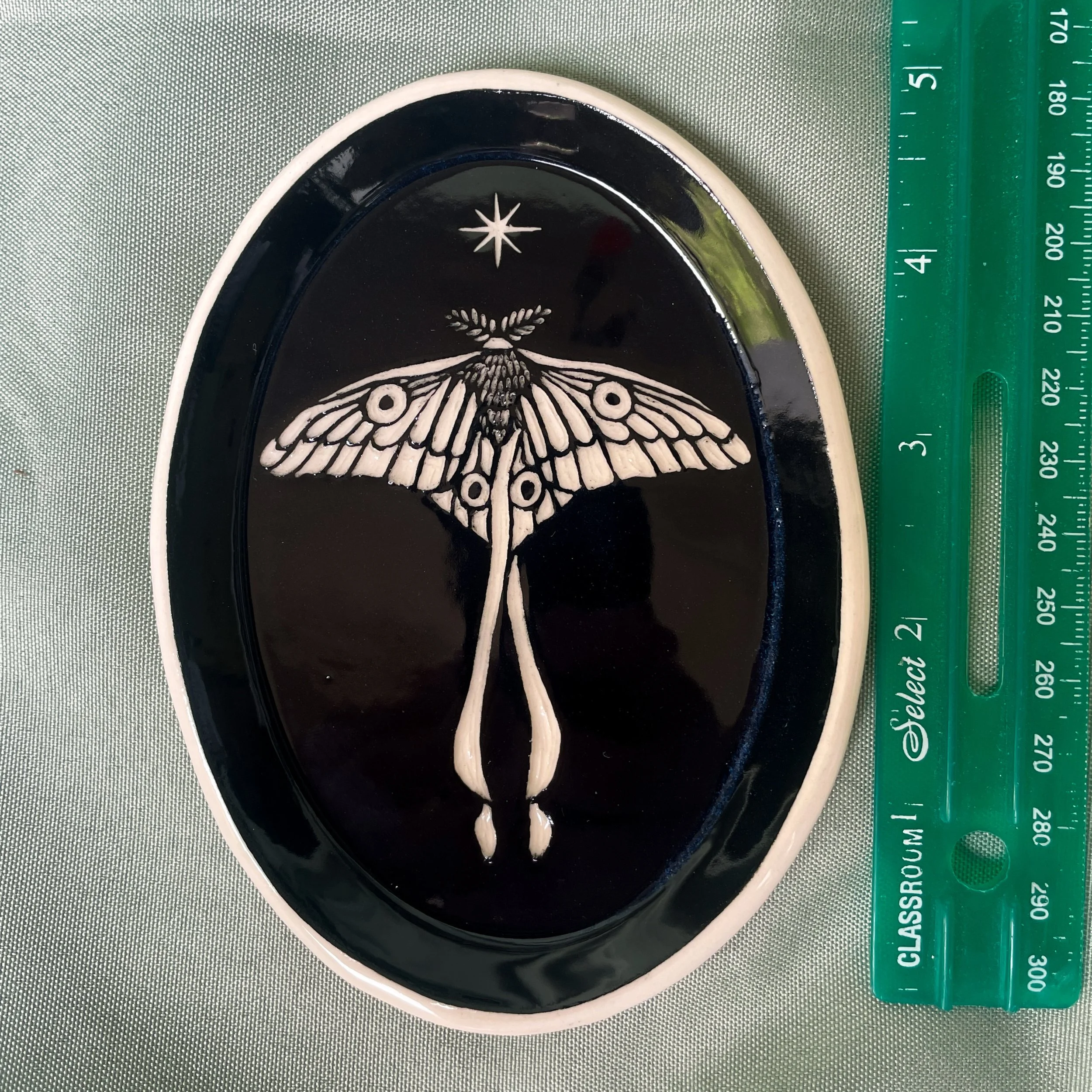 oval trinket dish moth ruler.JPEG