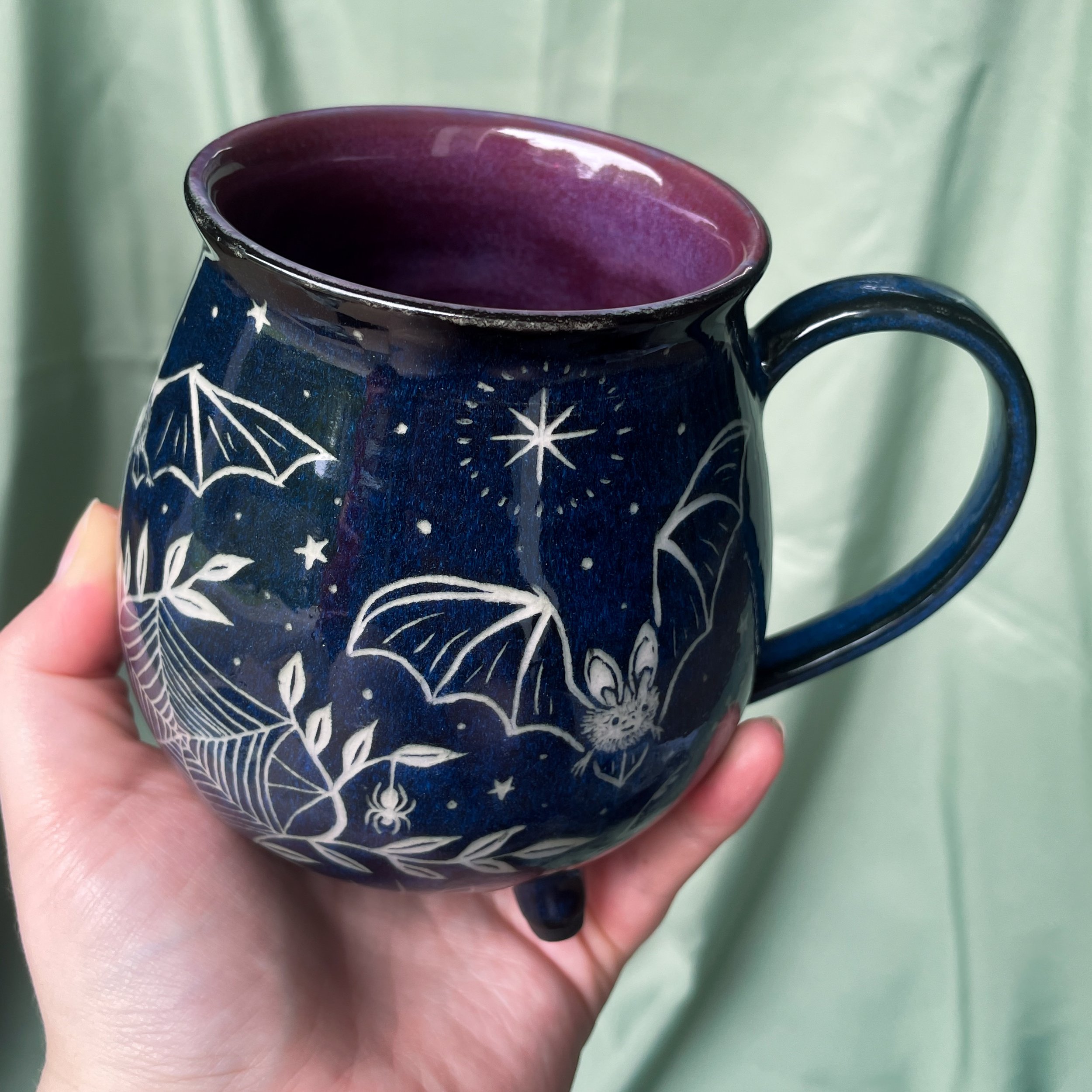 bat cauldron mug a held up.JPEG