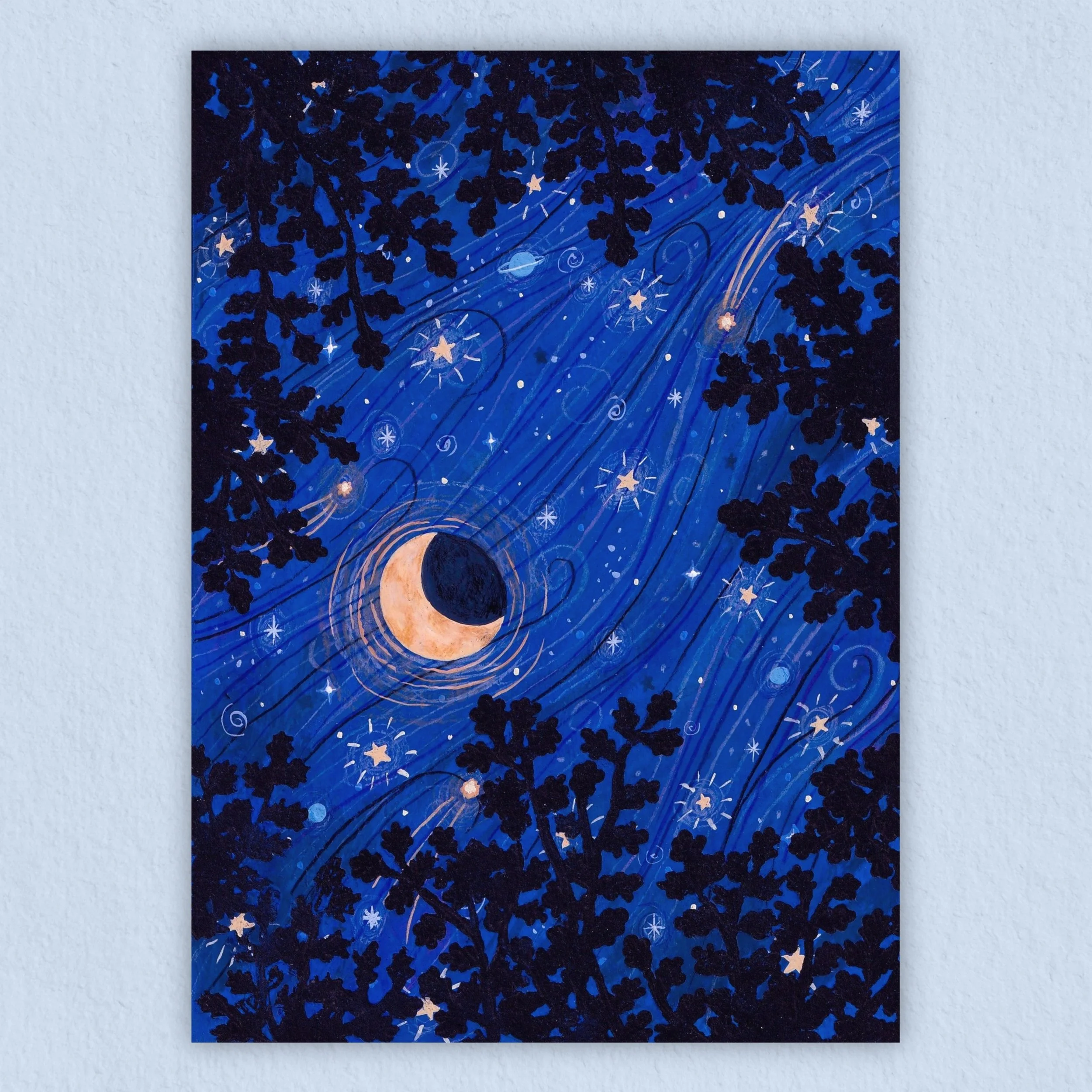 An art print of a yellow crescent moon in a starry night sky with a light blue background